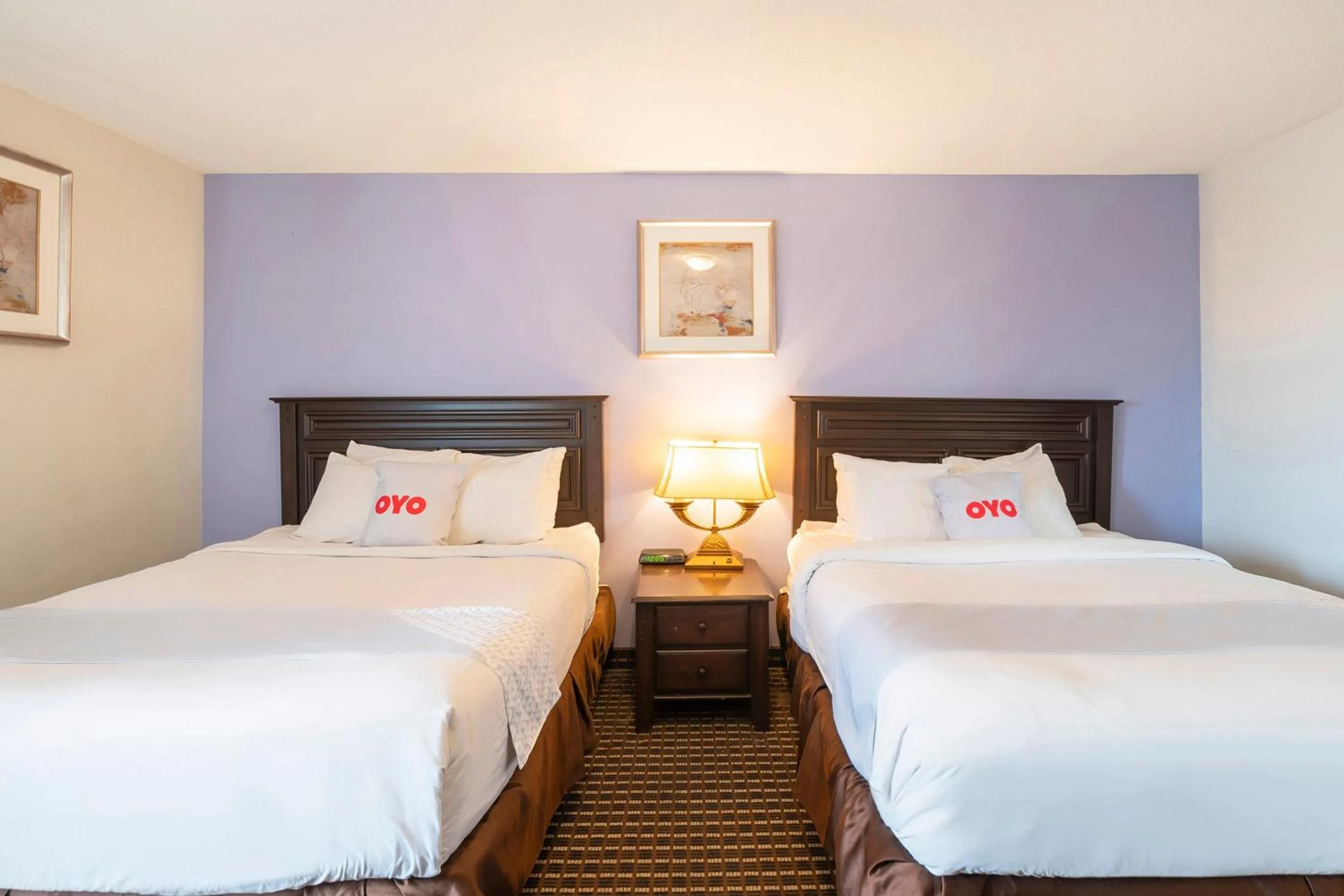 Bedroom, Bed in OYO Townhouse Houston Airport North