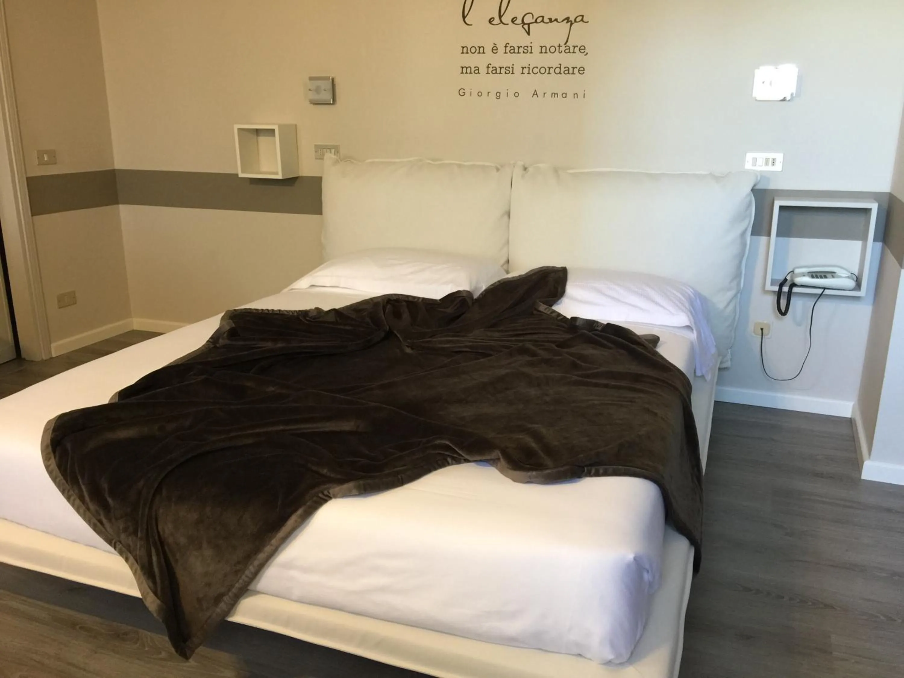 Bed in Albergo Al Cacciatore Tortellinando