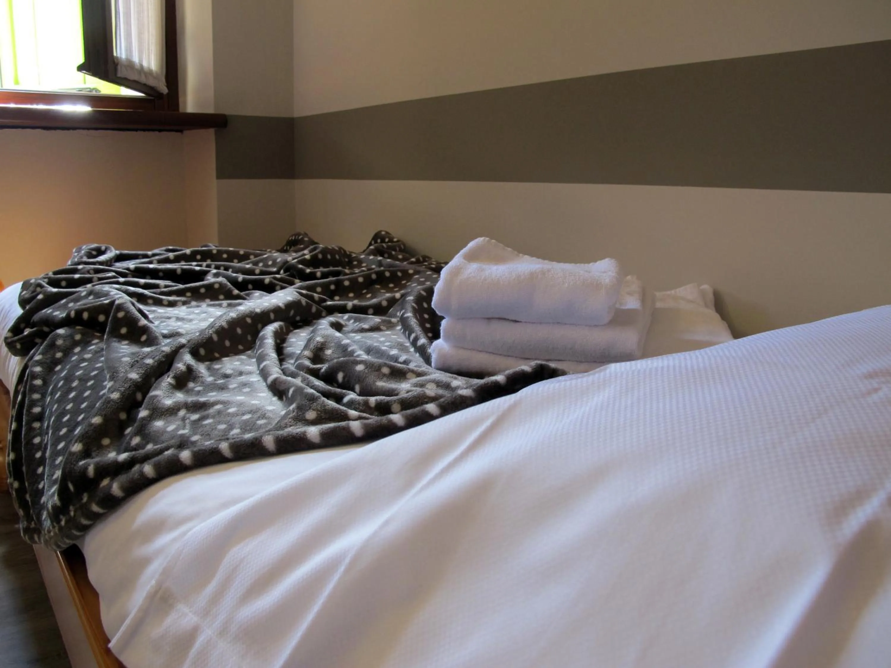 Bed in Albergo Al Cacciatore Tortellinando