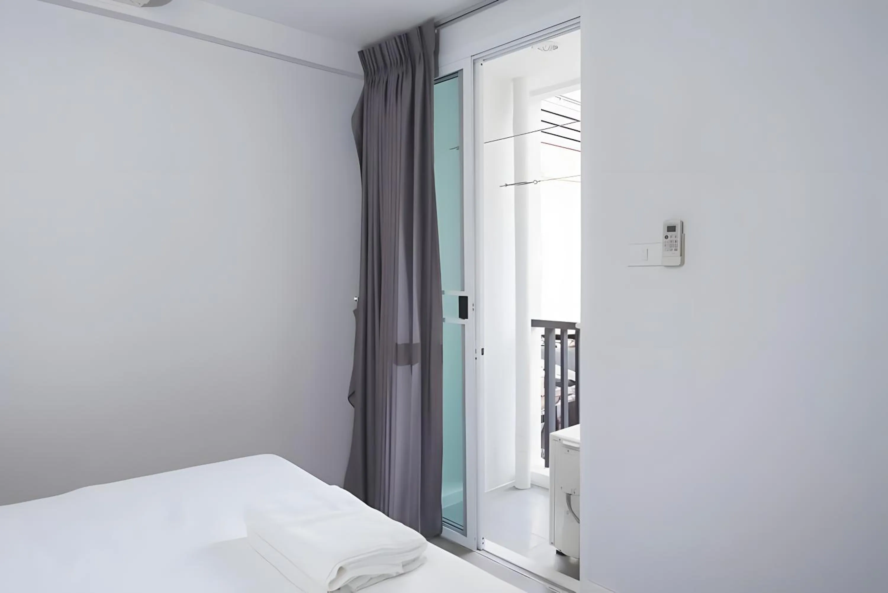 Photo of the whole room, Bed in XX Mitr Inn The Grand Palace Bangkok - Mrt Samyot Station