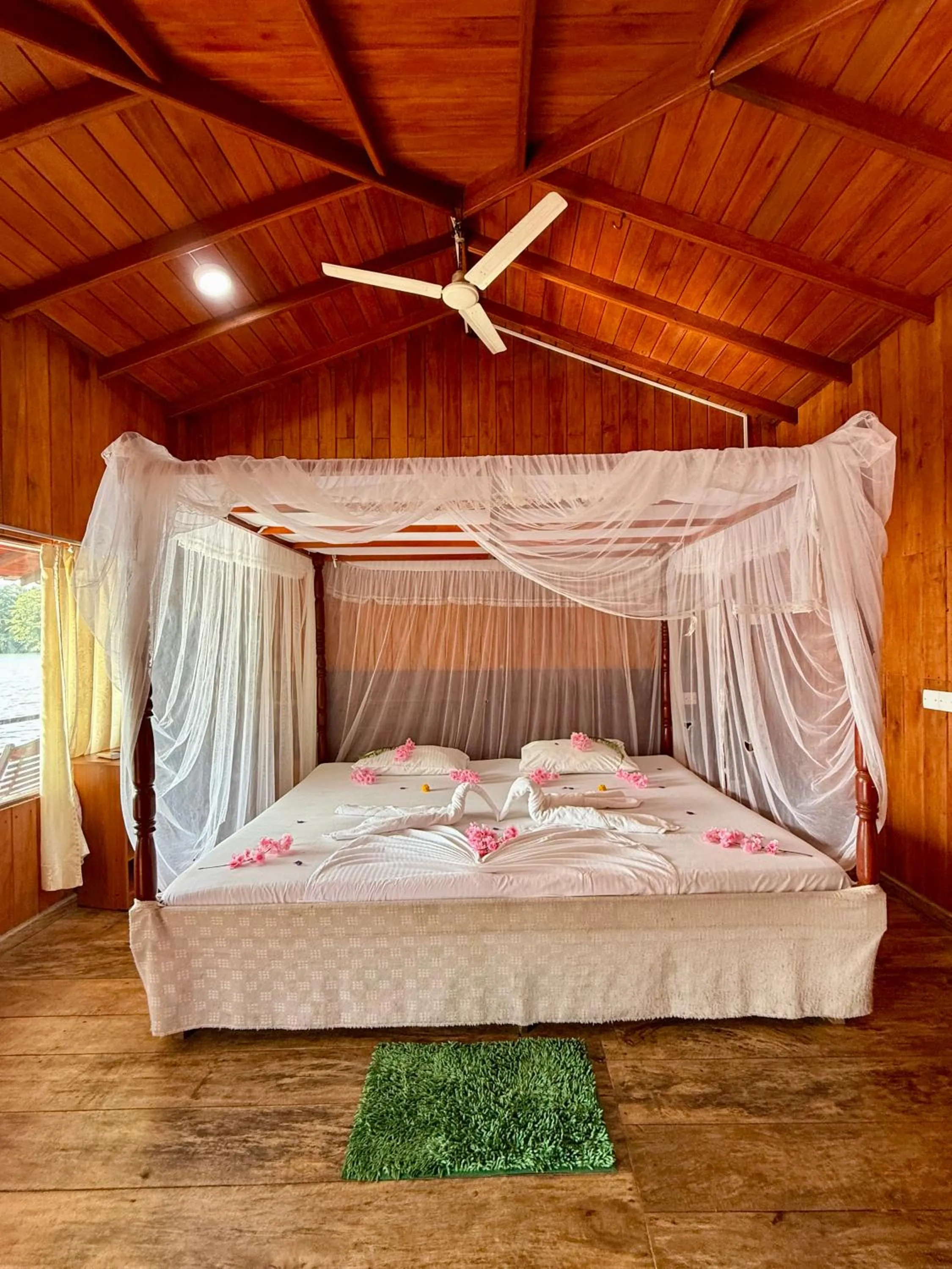 Bed in Shiny Lakeside Resort