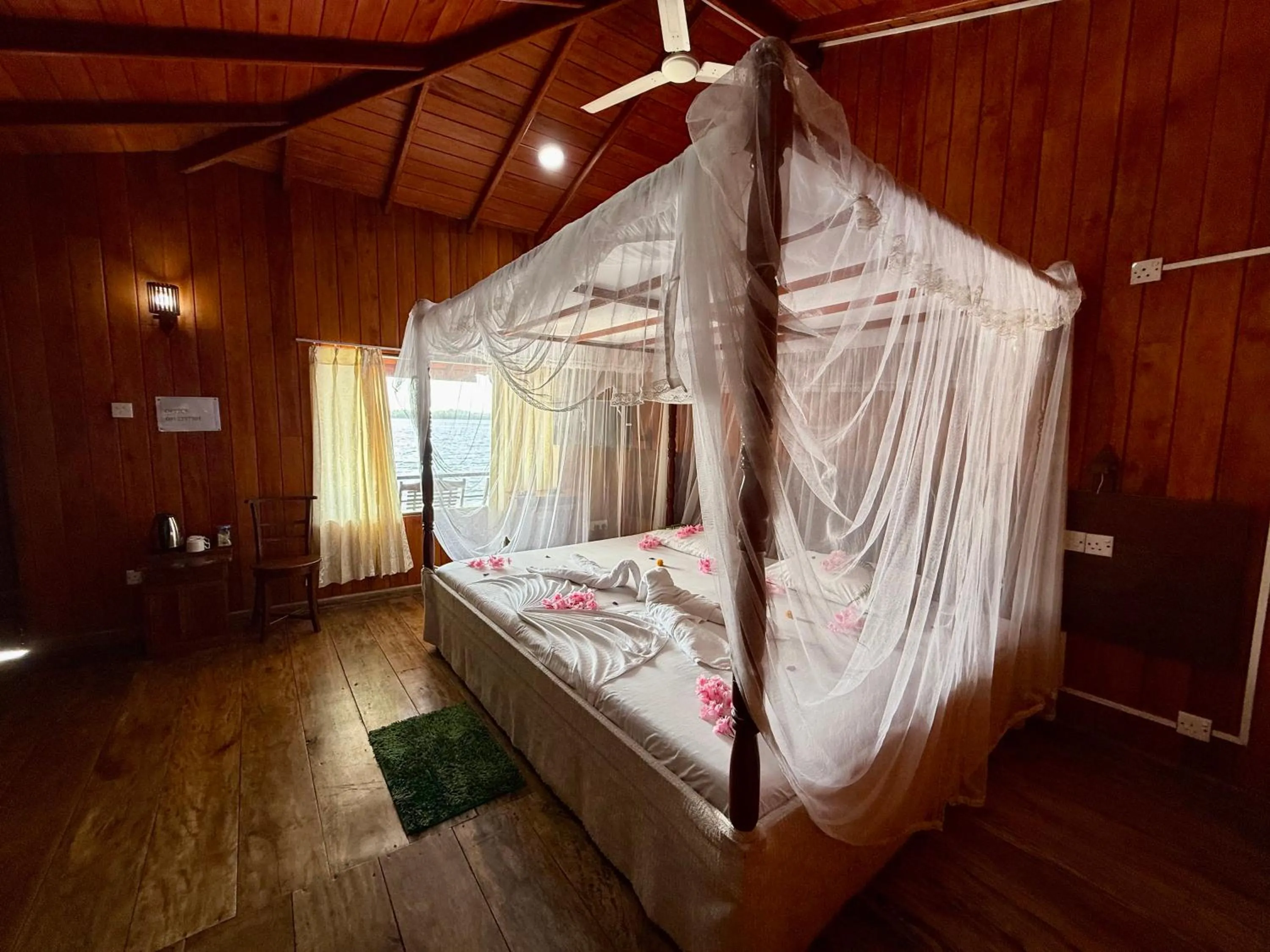 Bed in Shiny Lakeside Resort