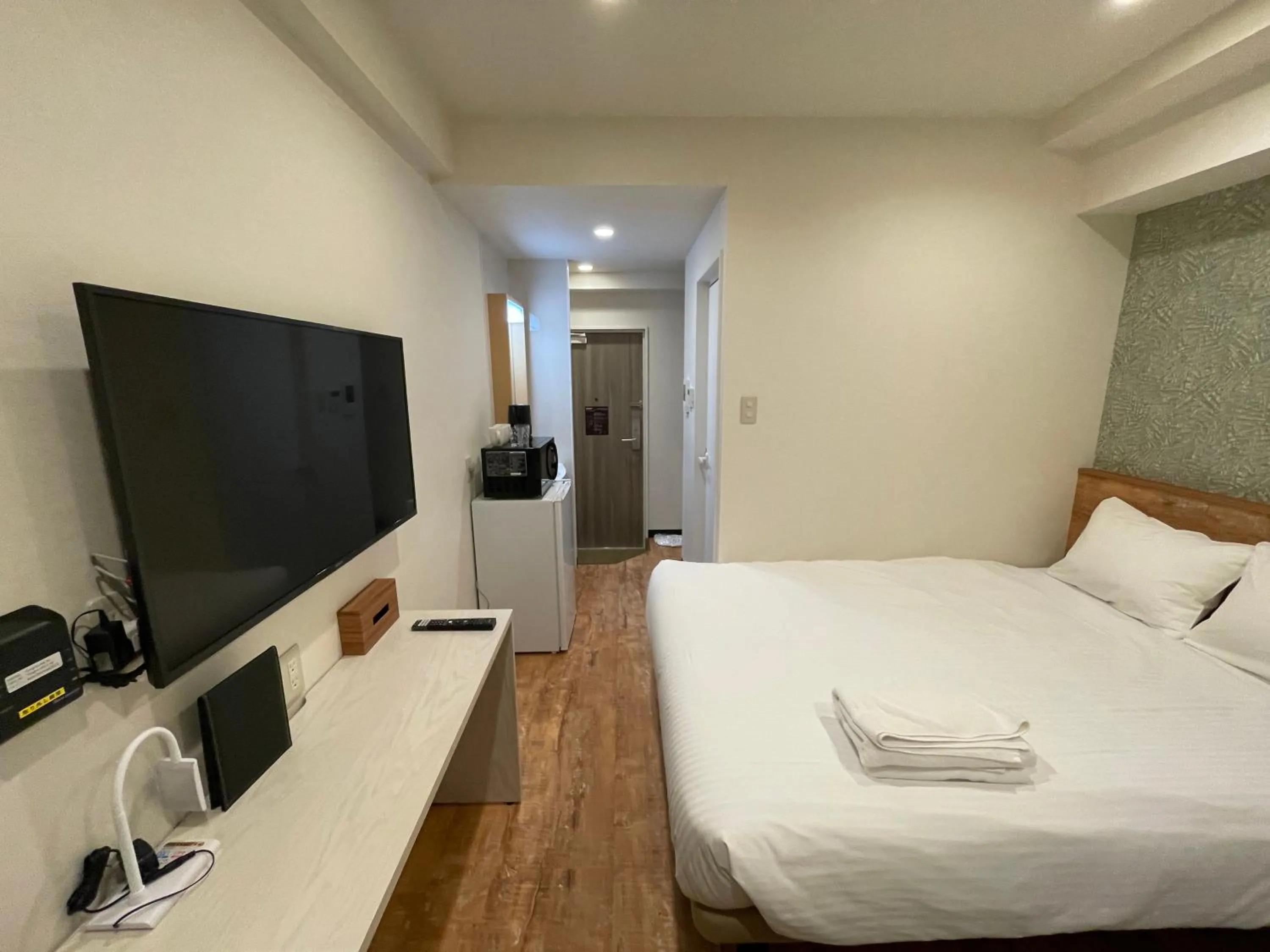 Photo of the whole room, Bed in Hotel Living Inn Kenchoumaeeki