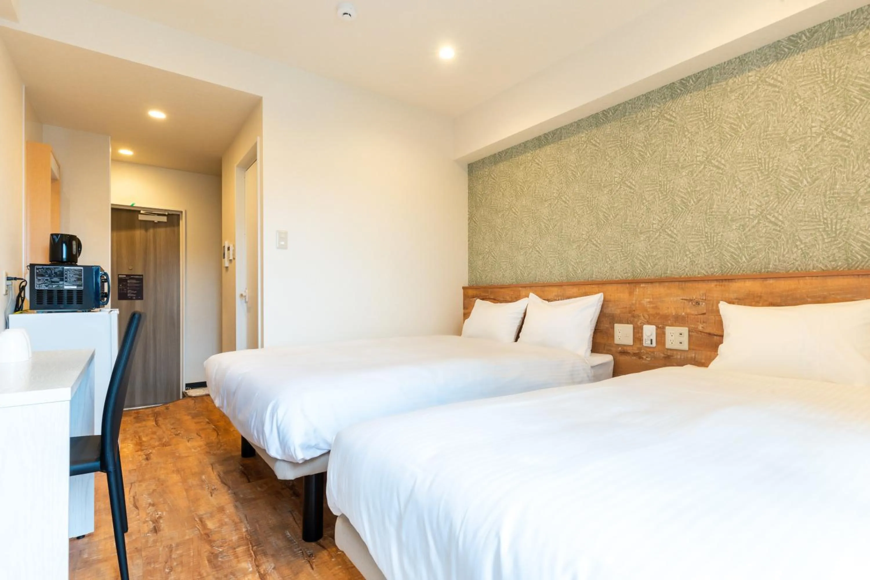 Bed in Hotel Living Inn Kenchoumaeeki