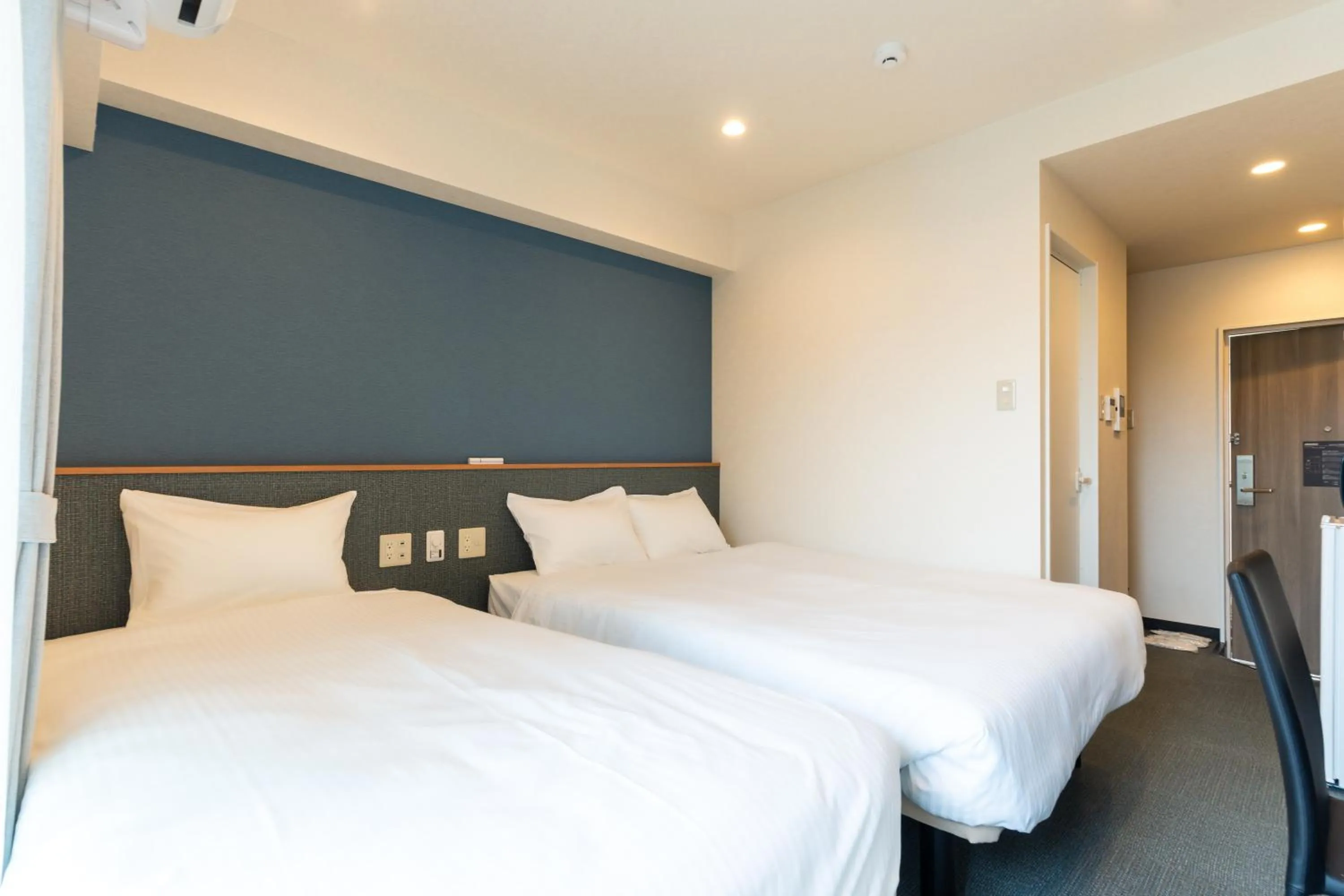 Bed in Hotel Living Inn Kenchoumaeeki