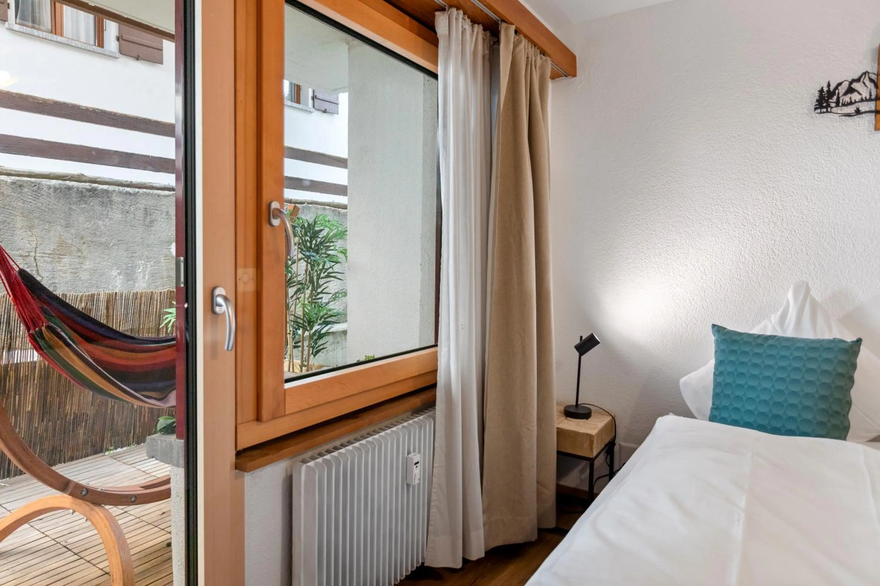 Patio, Bed in Centre de Saas-Fee - 2 chambres - balcon & patio