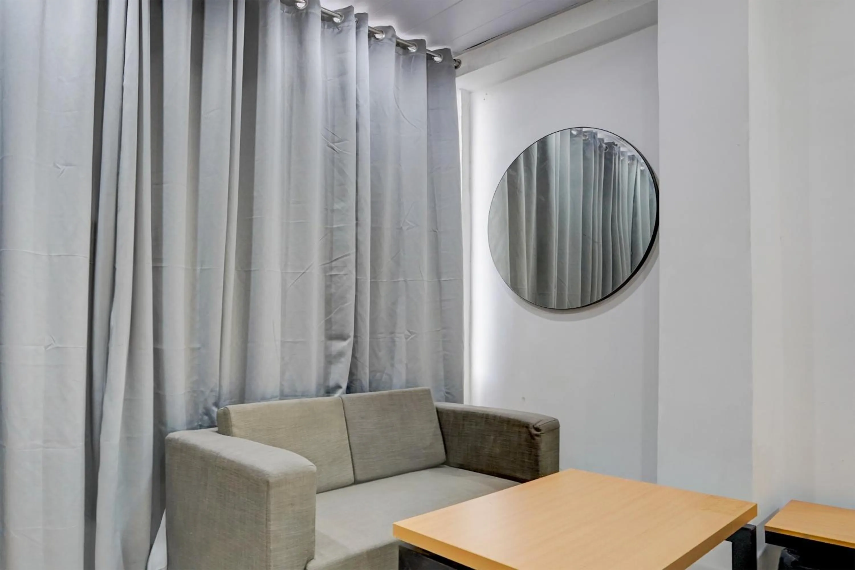 Living room in Hotel Downtown by Quadis - Sector 15 Noida