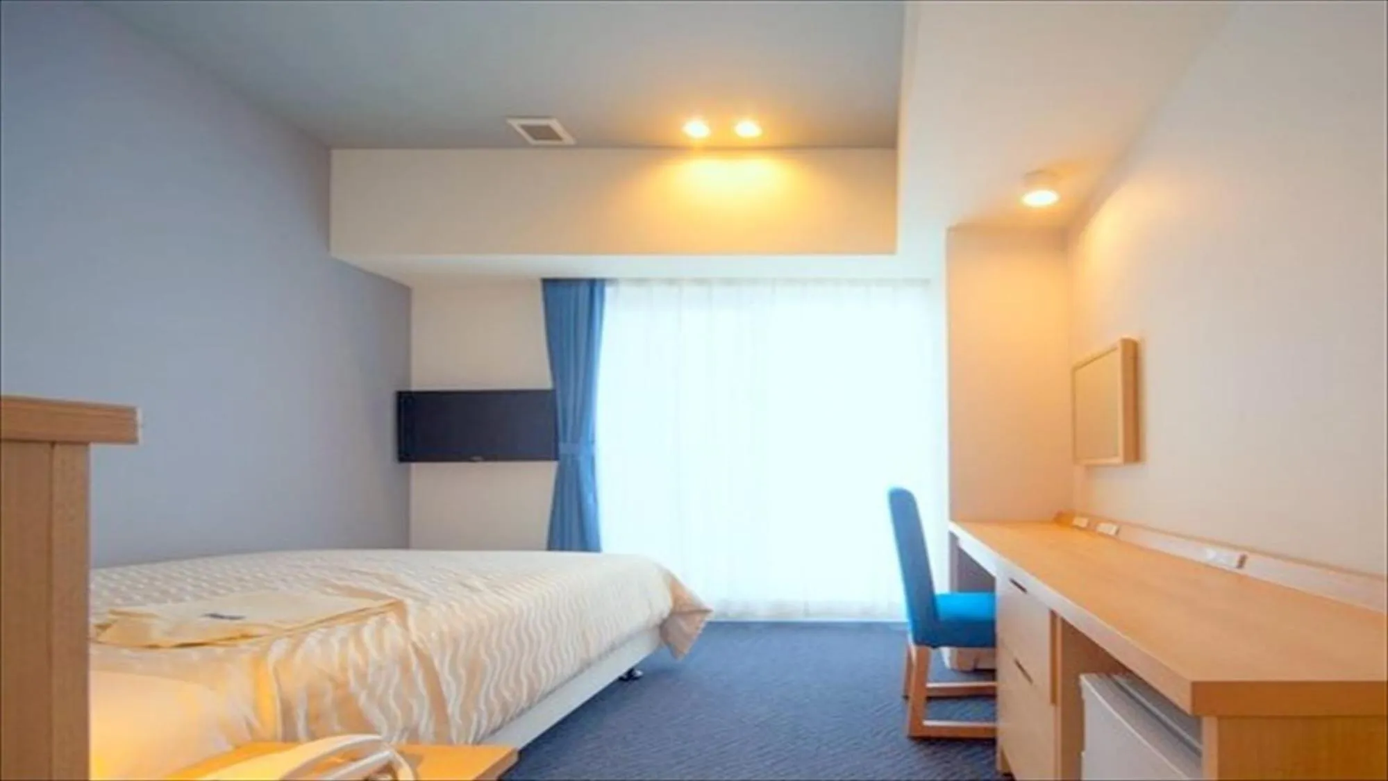 Photo of the whole room, Bed in Hotel Risingsun Miyakojima