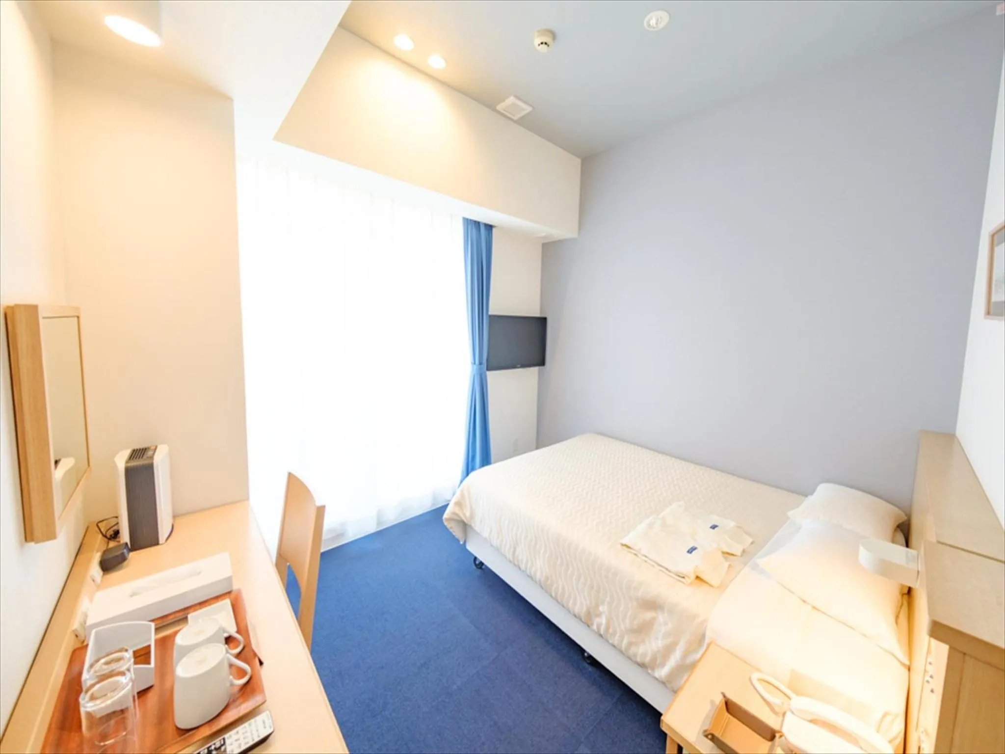 Photo of the whole room, Bed in Hotel Risingsun Miyakojima