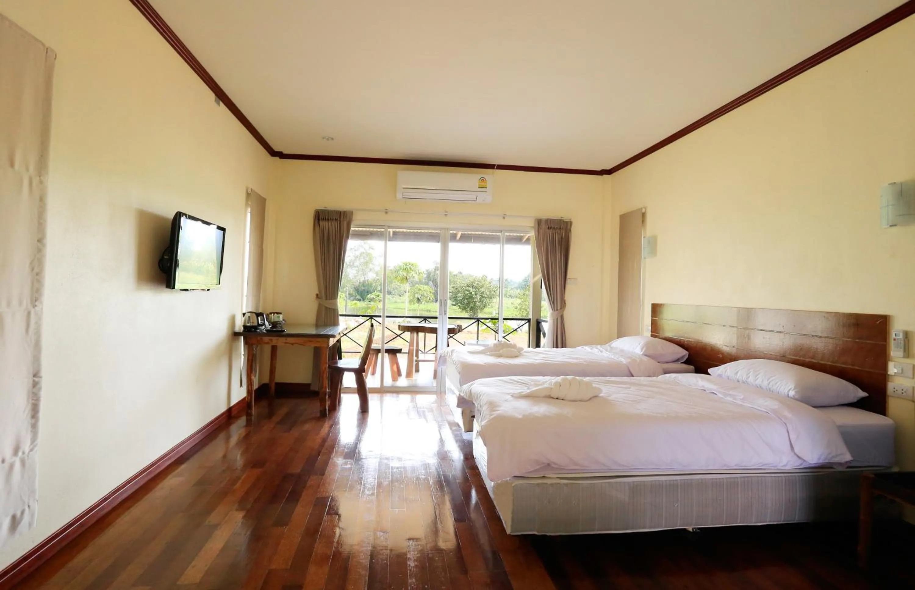 Living room, Bed in Be Fine Sabuy Hotel and Resort