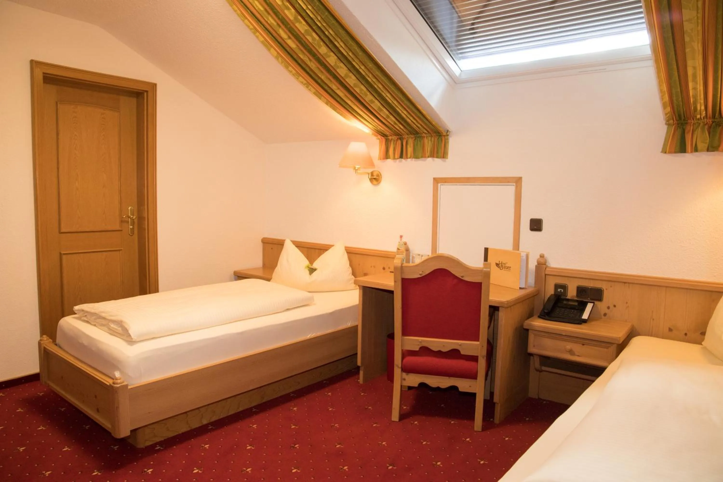 Photo of the whole room, Bed in Hotel Bauer garni