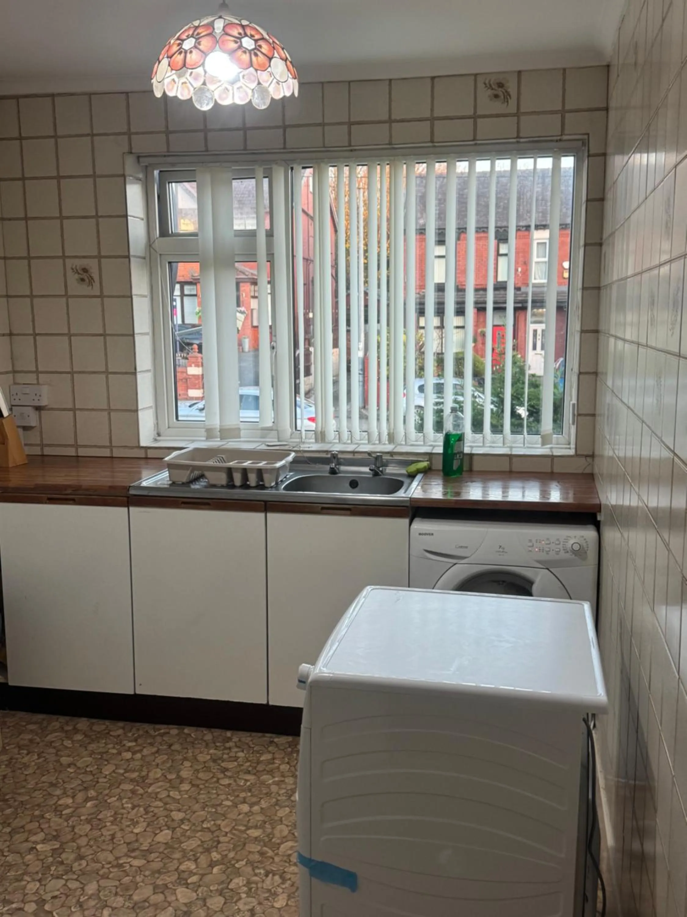 Kitchen or kitchenette in Komegloba Exquisite room