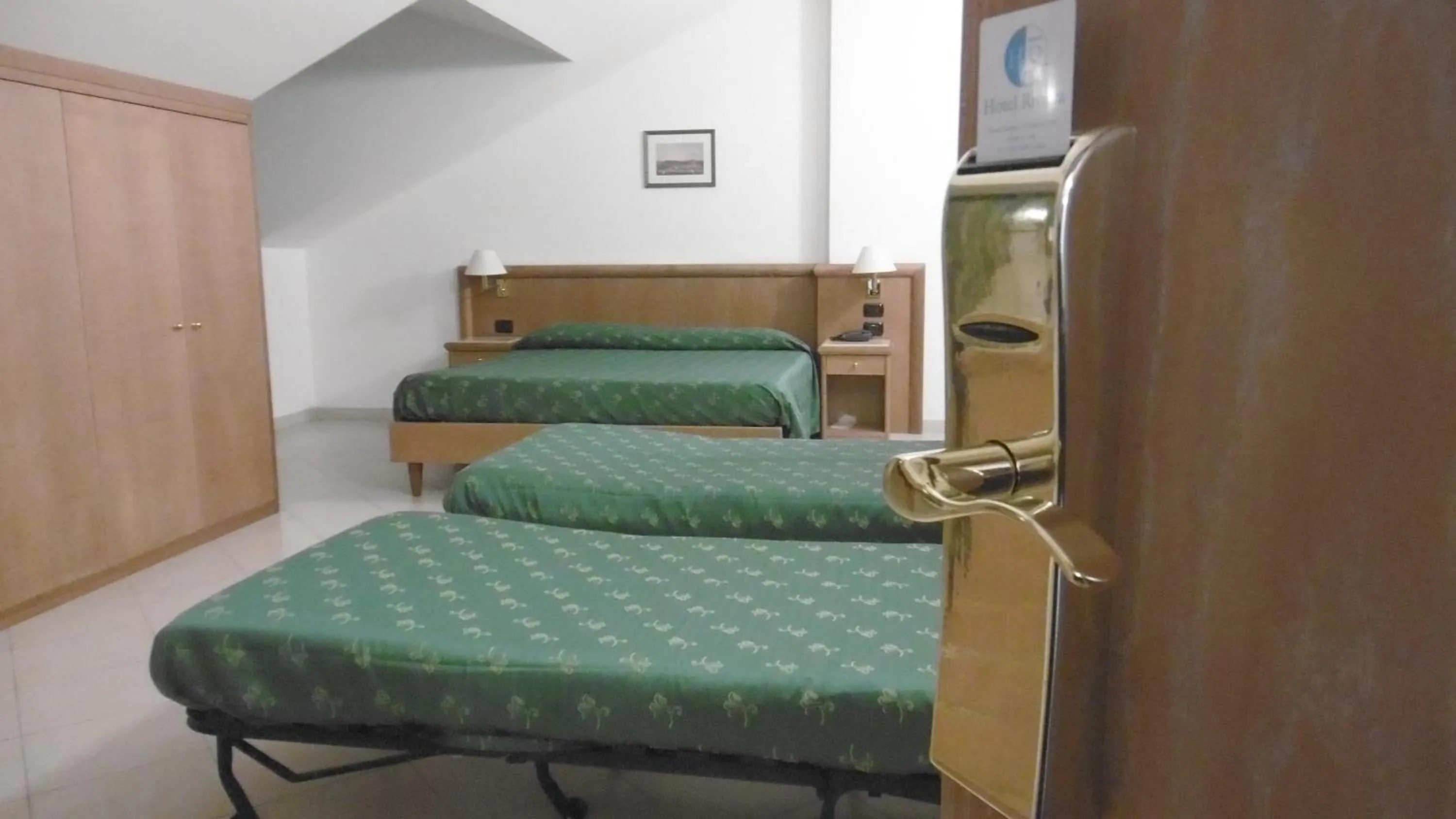 Bed in Hotel Riviera