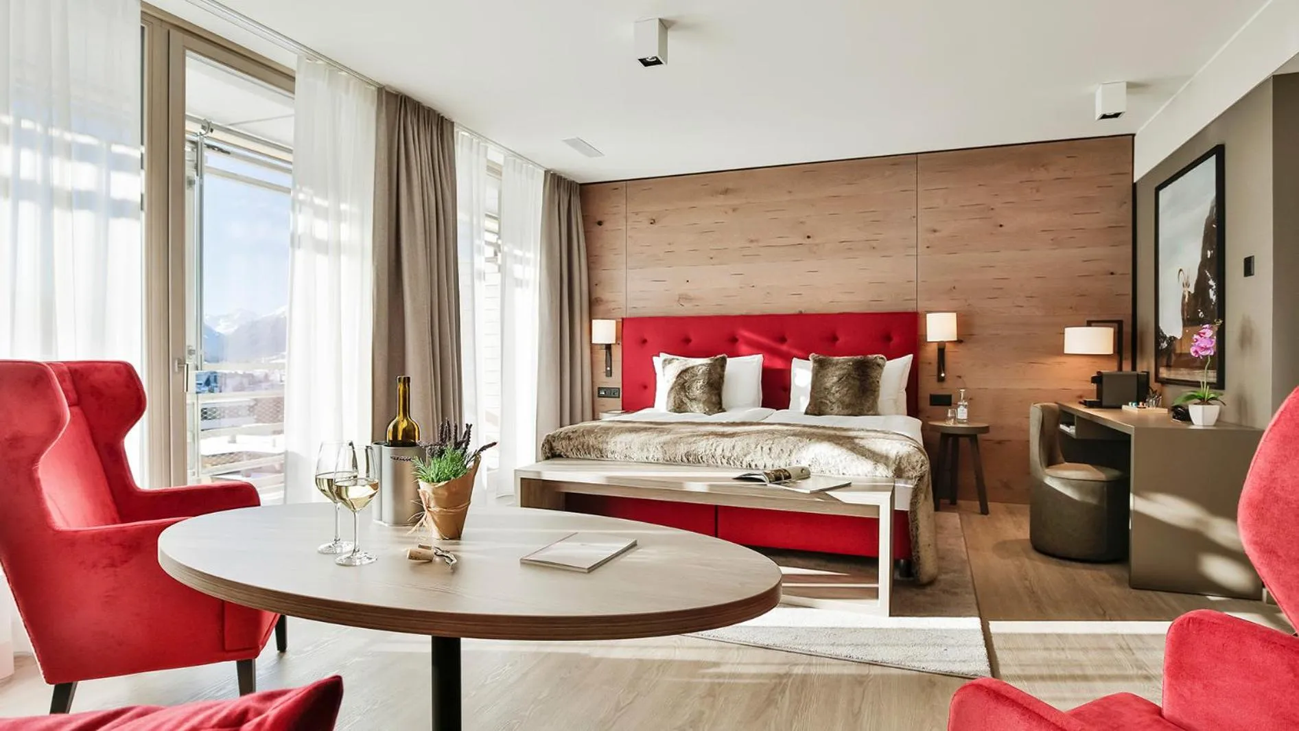 Seating area, Bed in AMERON Davos Swiss Mountain Resort