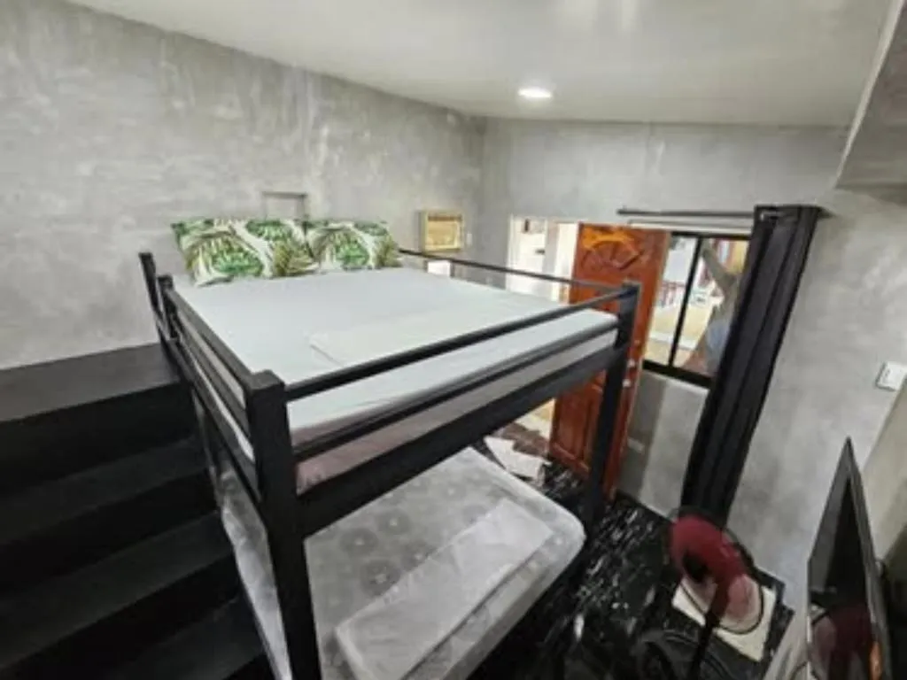 Bed in Acacia Sunset Village Inn