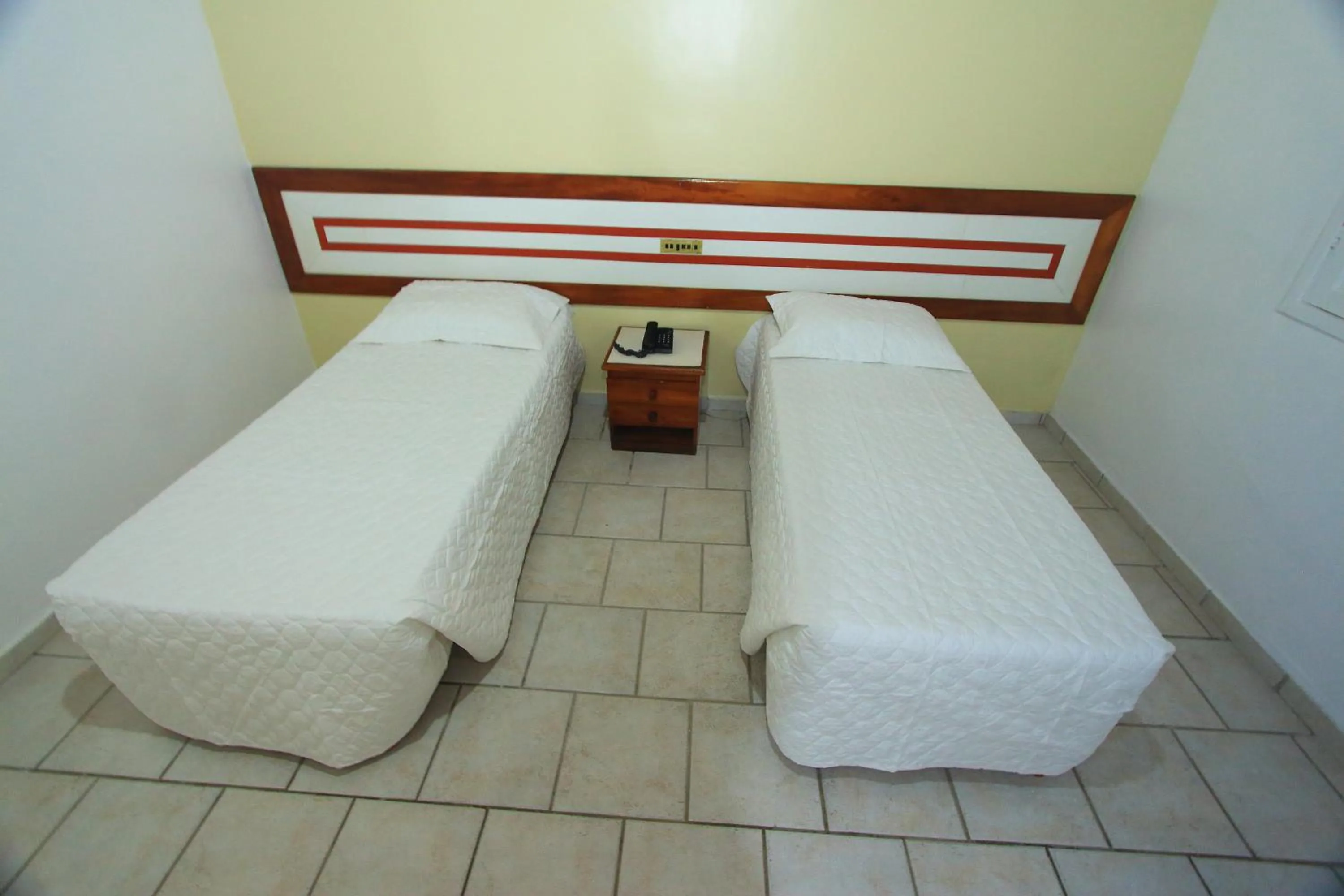 Bed in Navegantes Hotel
