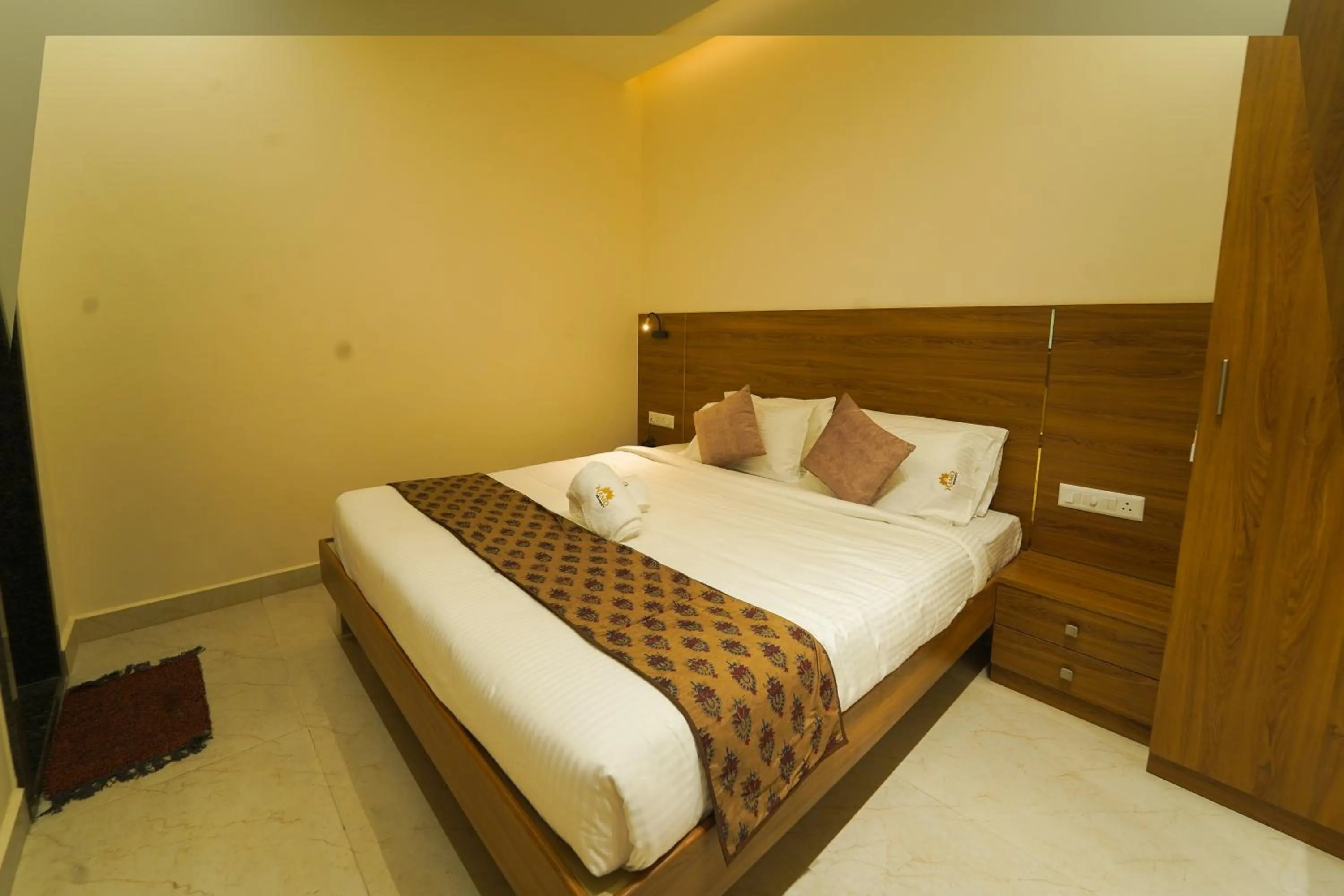 Bed in Namo Residency