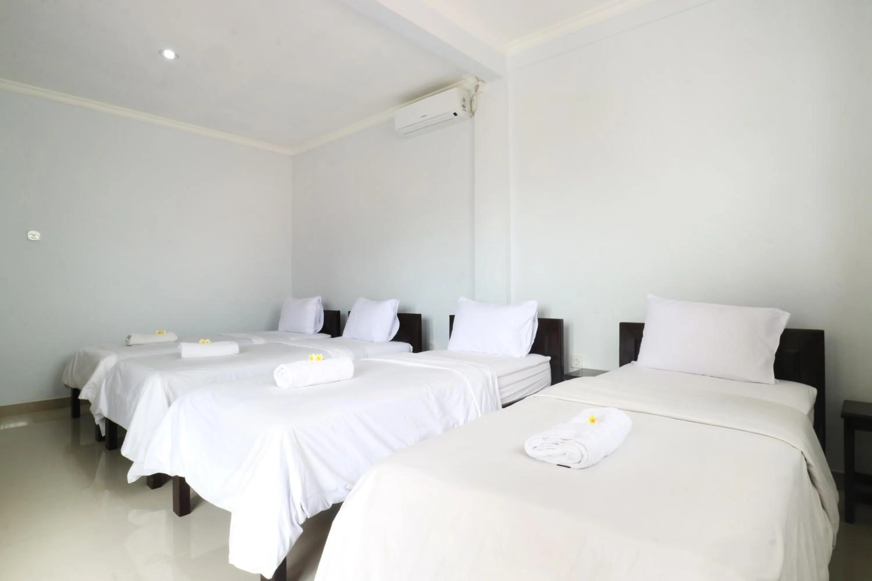 Bedroom, Bed in The Wina Echo Beach Guest House