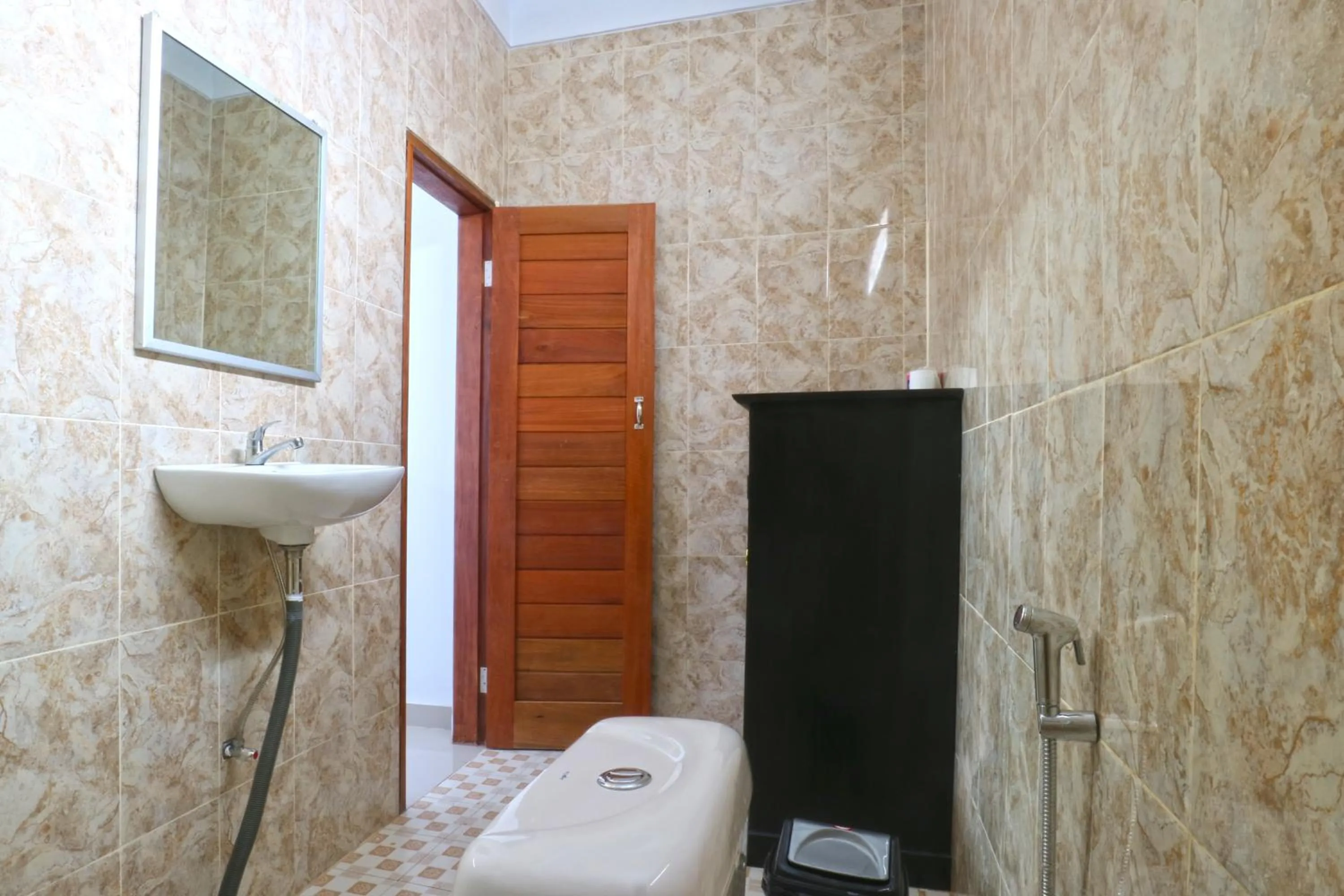 Bathroom in The Wina Echo Beach Guest House