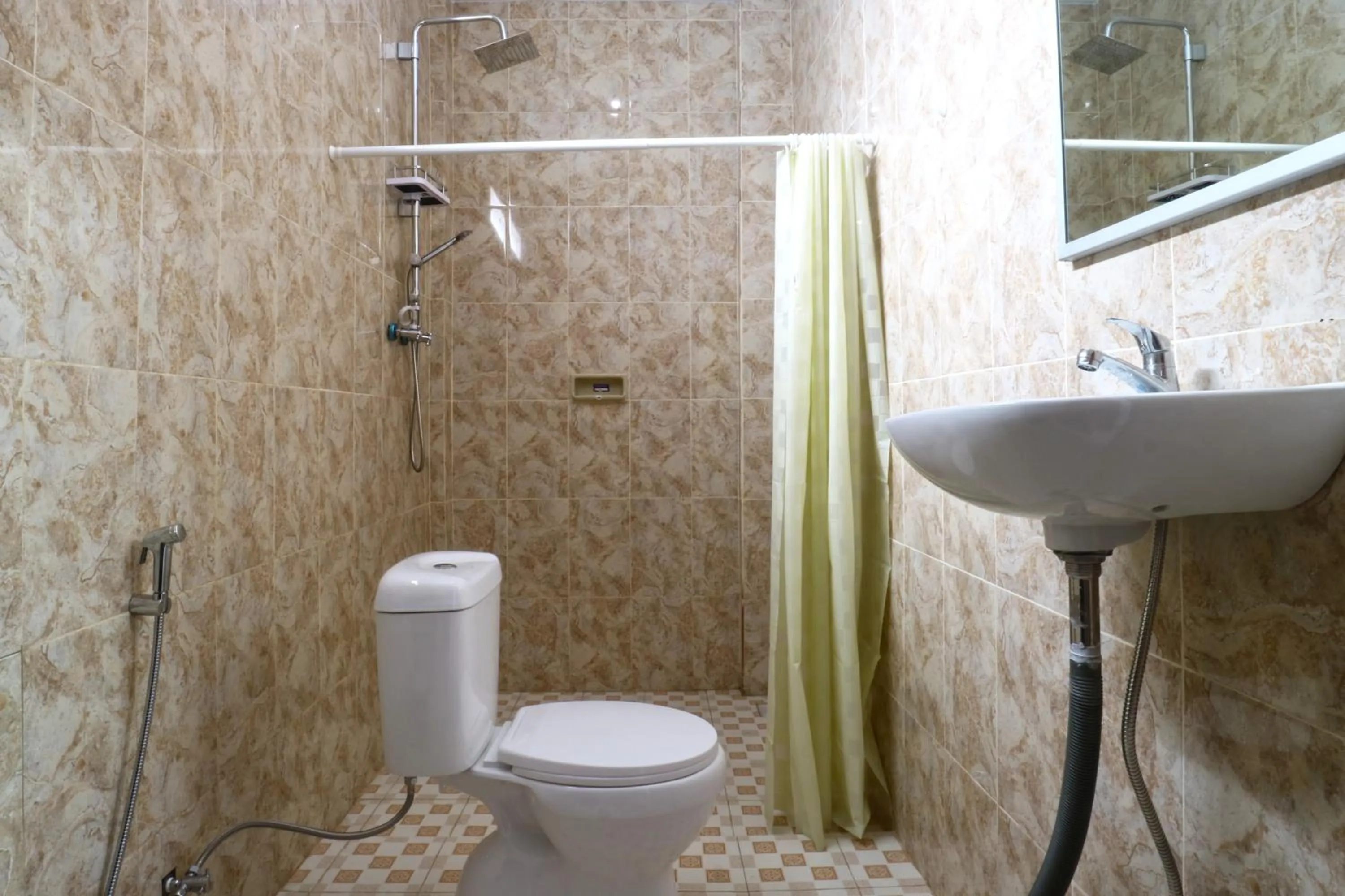 Bathroom in The Wina Echo Beach Guest House