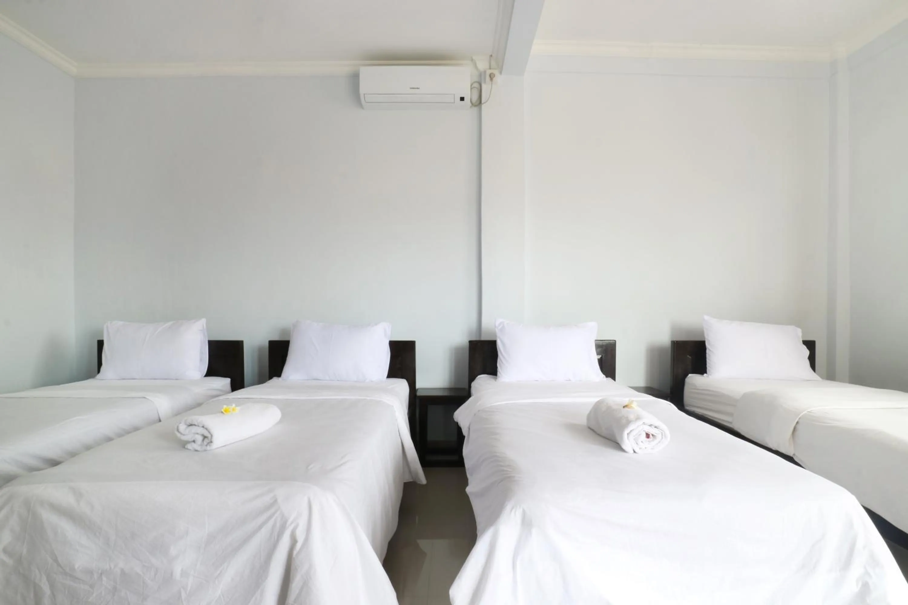 Bedroom, Bed in The Wina Echo Beach Guest House