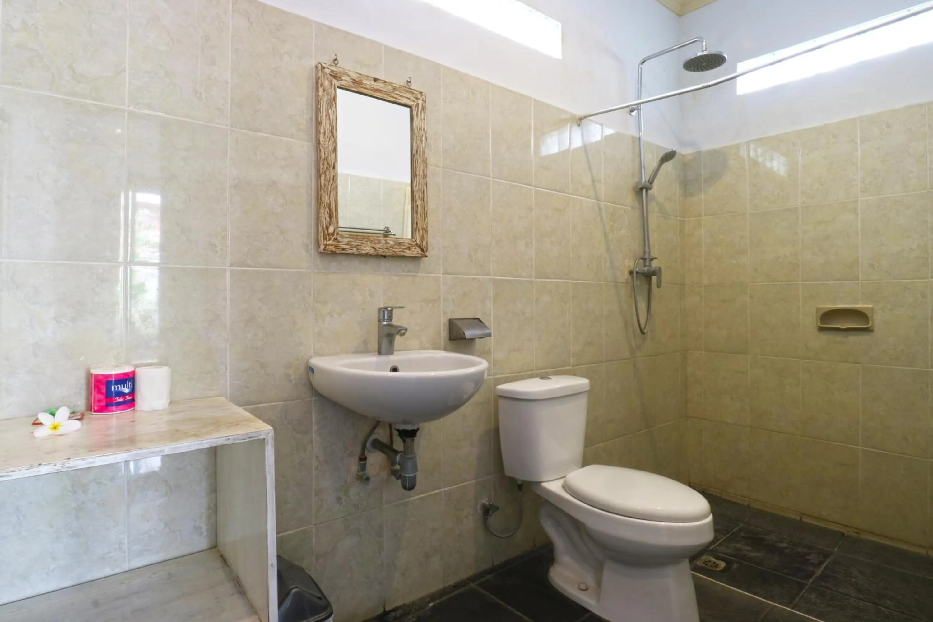 Bathroom in The Wina Echo Beach Guest House