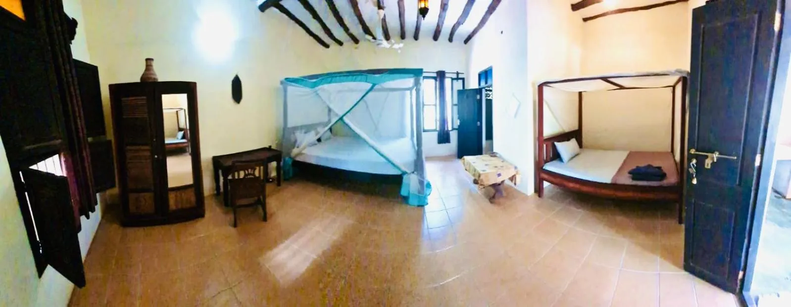 Photo of the whole room, Bed in Casa Umoja