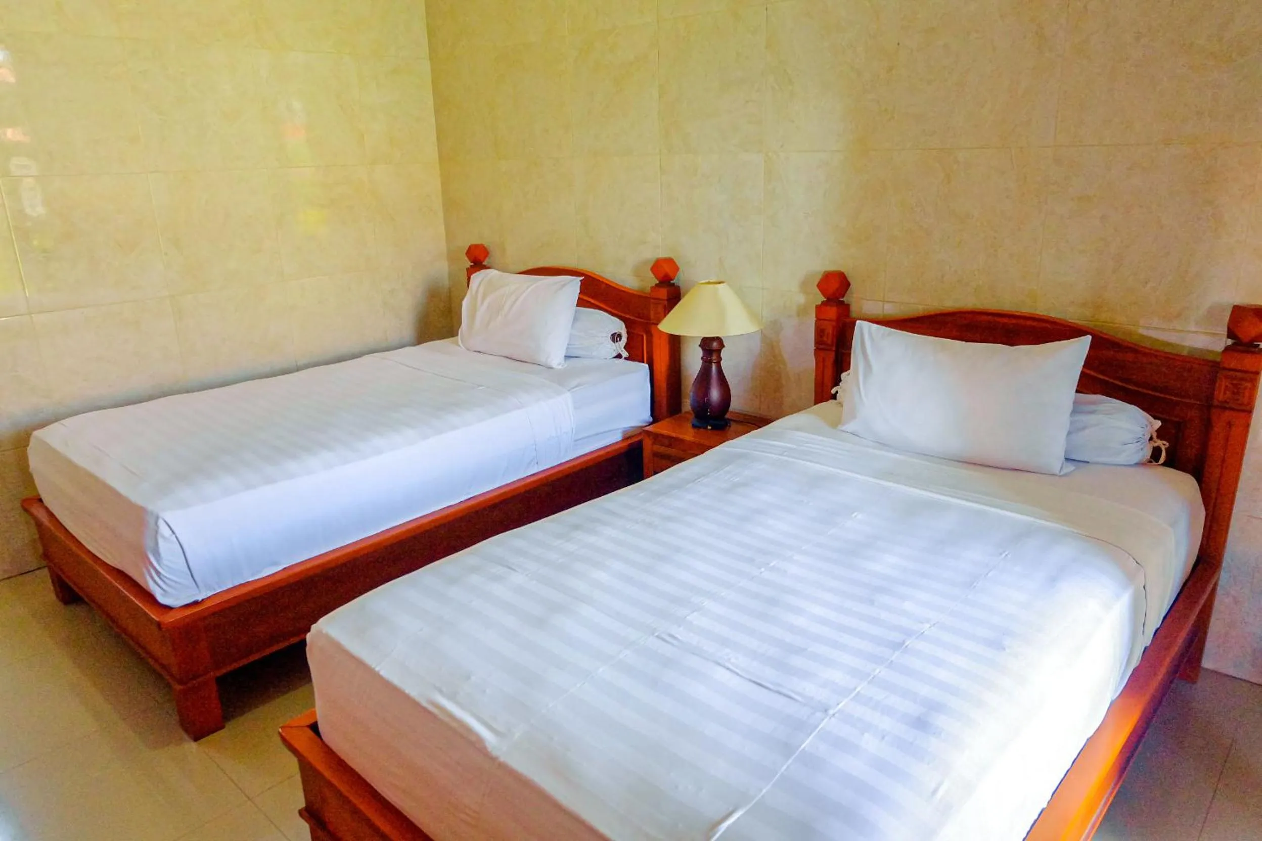 Bed in Adi Homestay