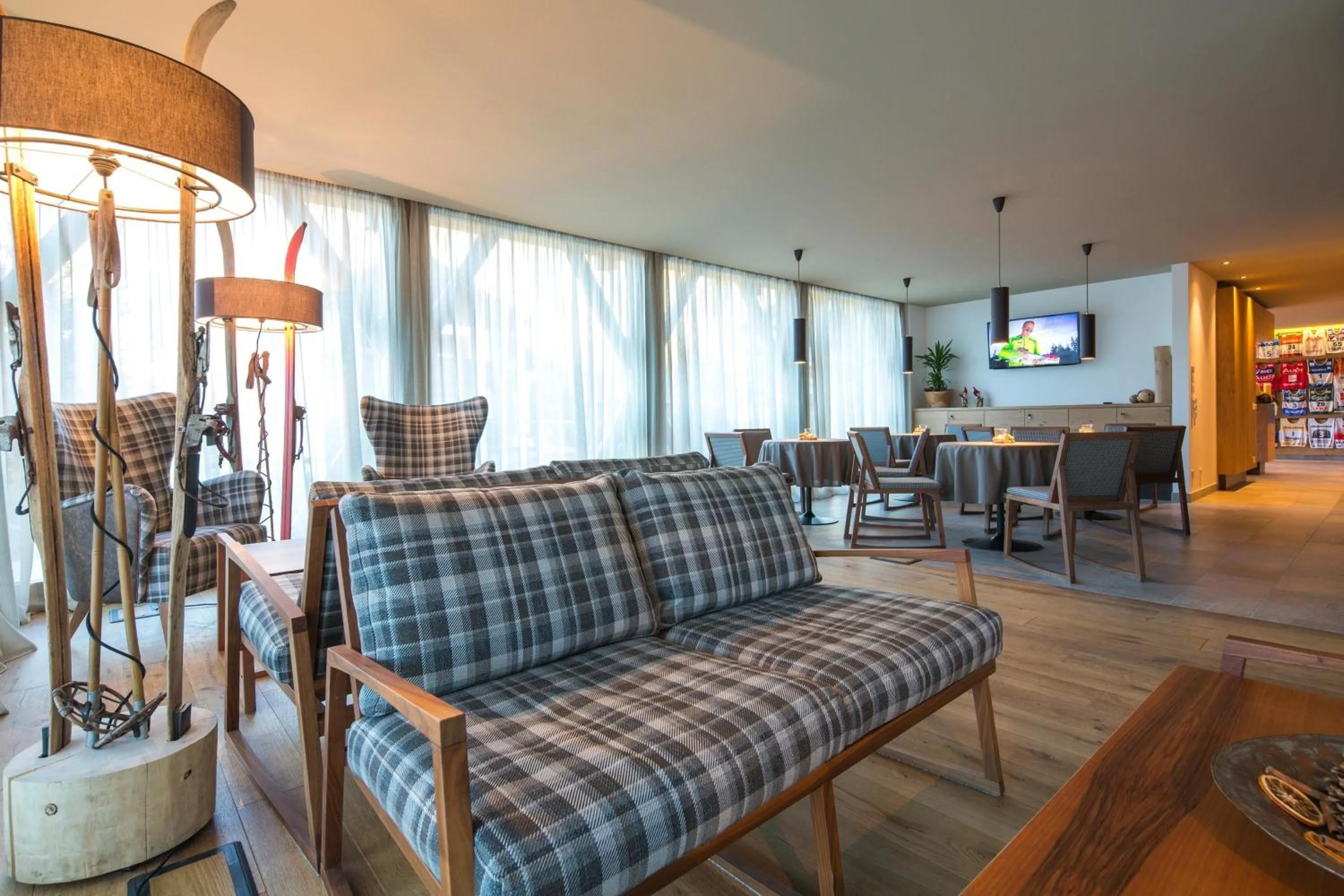 Communal lounge/ TV room in Mölgg Dolomites Residence