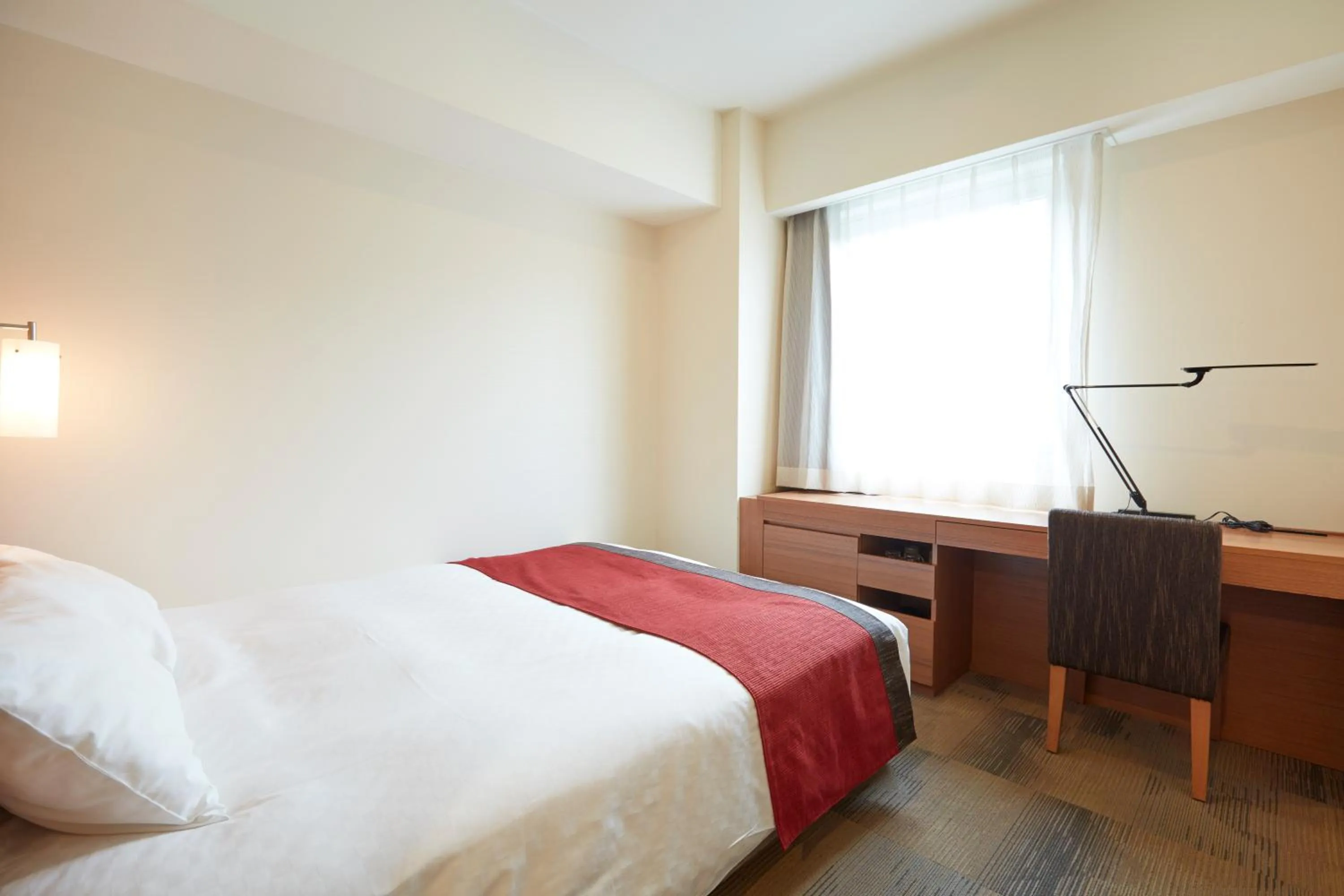 Bed in Hotel Folkloro Sanrikukamaishi