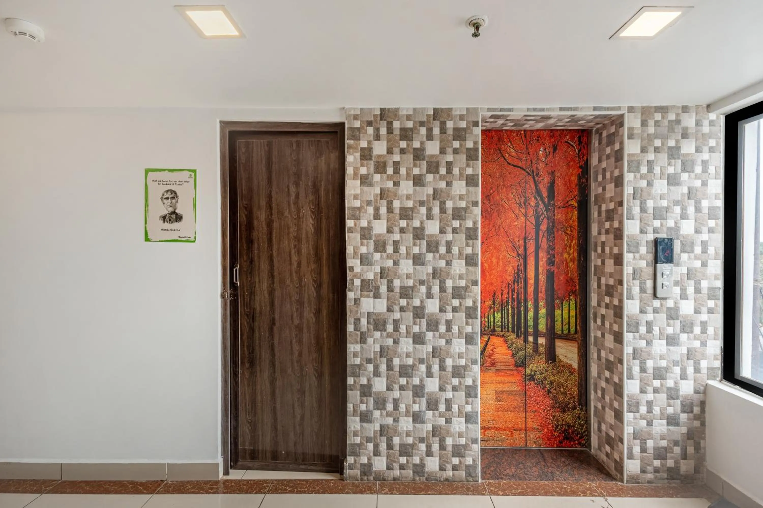 elevator in Treebo South Avenue, 700 Mts From Promenade Beach