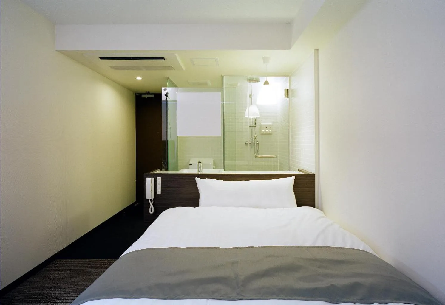 Bed in Hotel Inside Numazu Inter