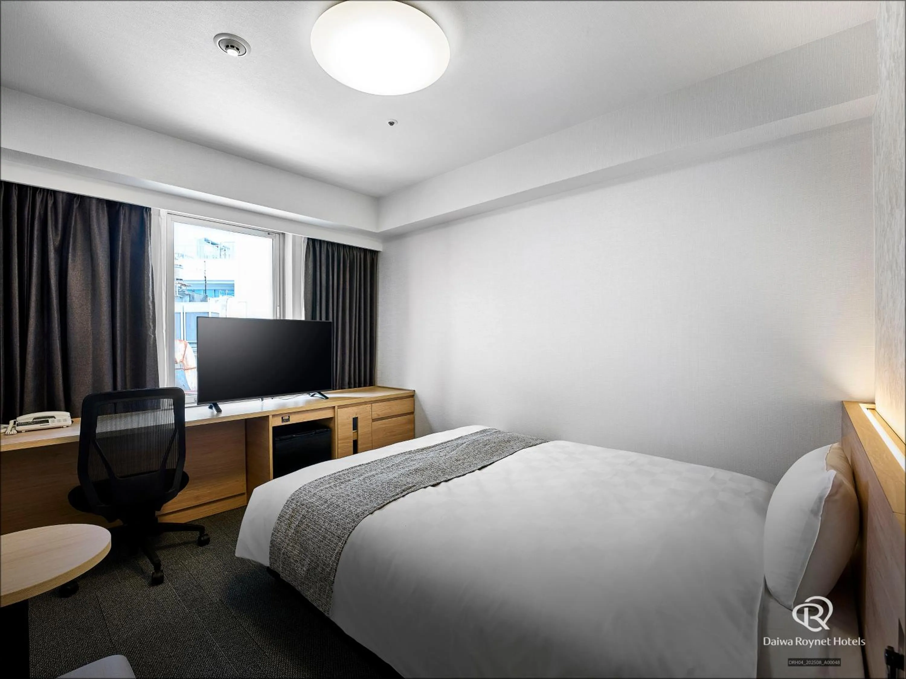 Bed in Daiwa Roynet Hotel Hamamatsu