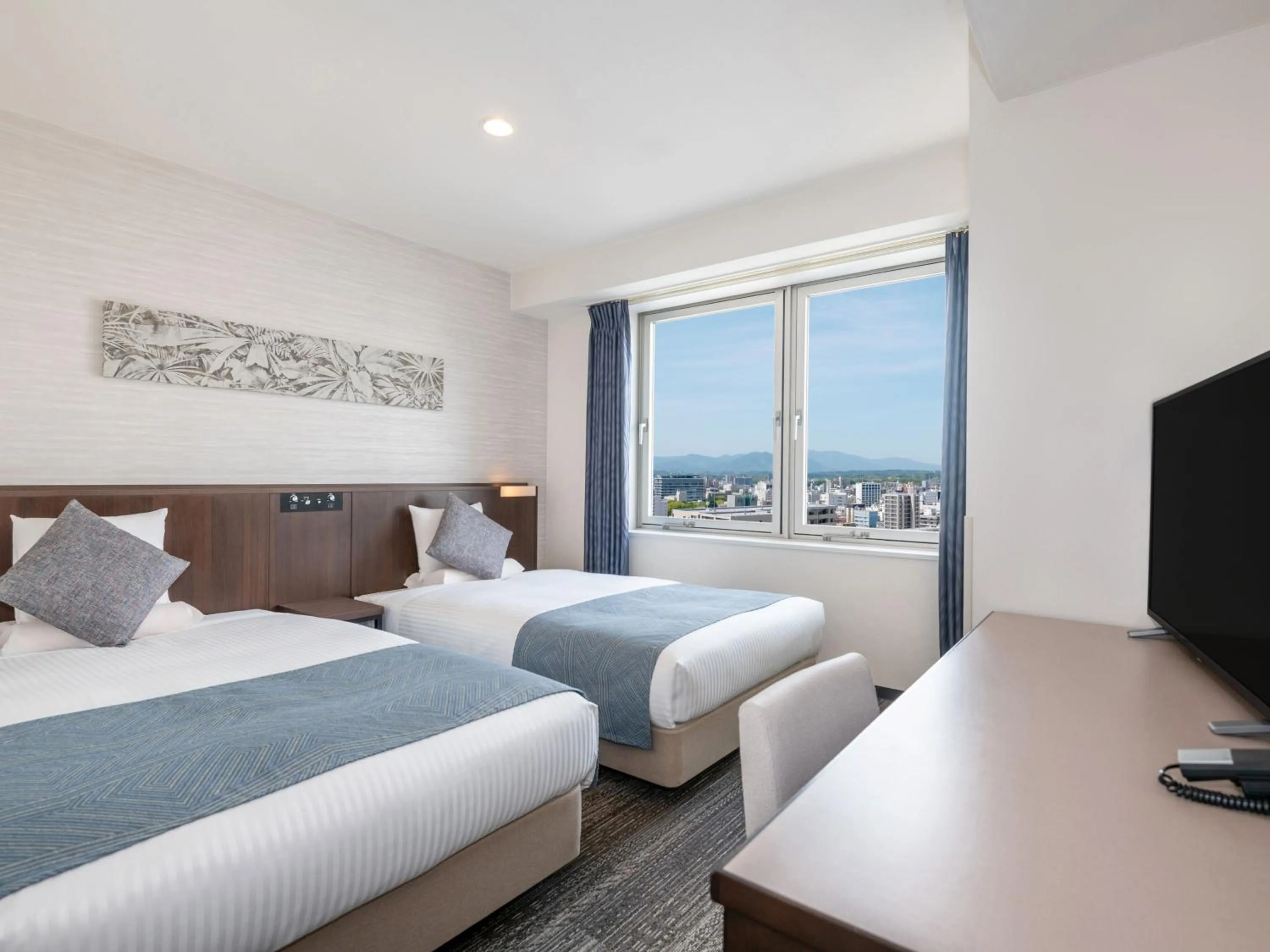 Photo of the whole room, Bed in ART HOTEL Miyazaki Sky Tower