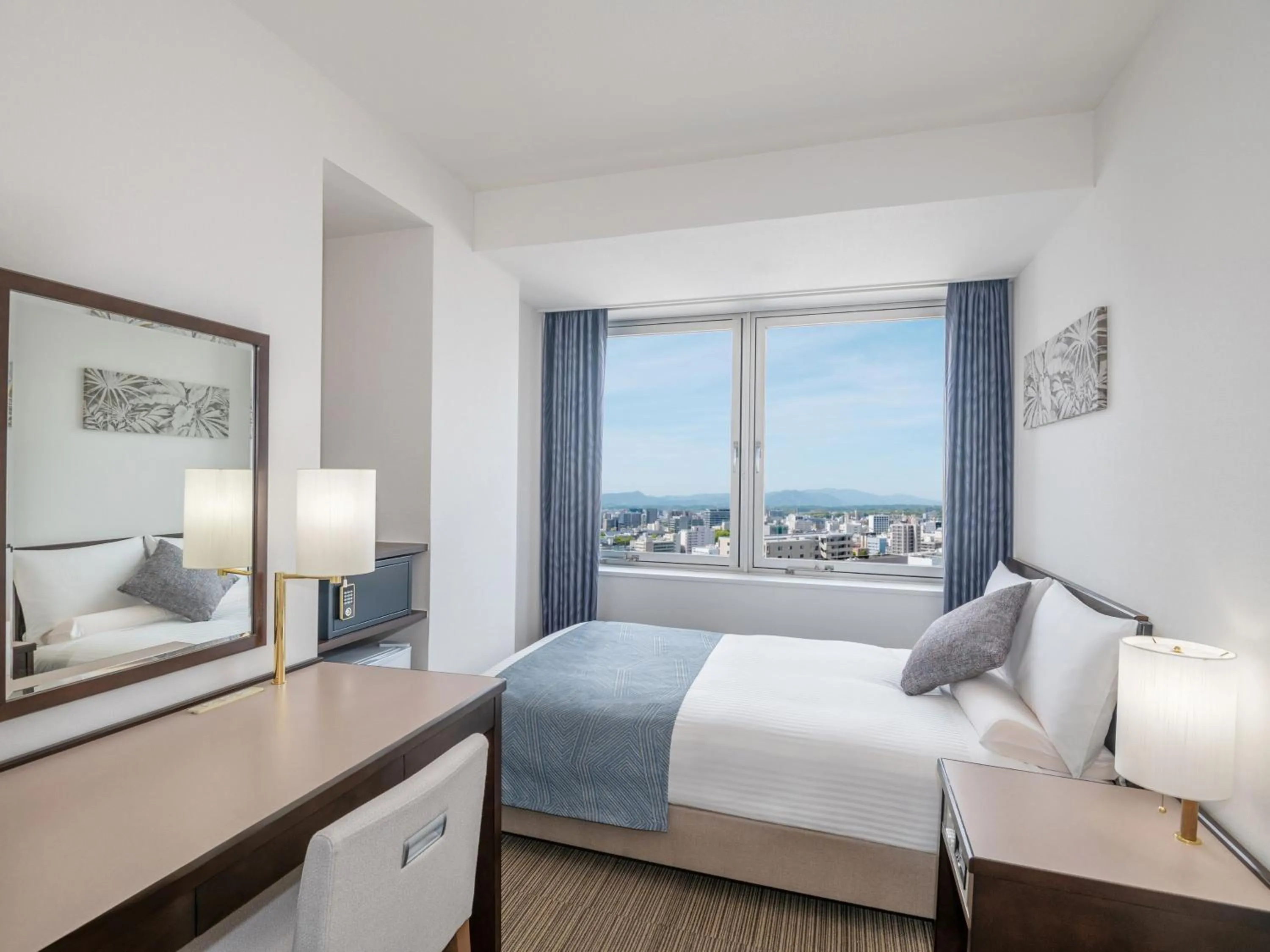 Photo of the whole room, Bed in ART HOTEL Miyazaki Sky Tower