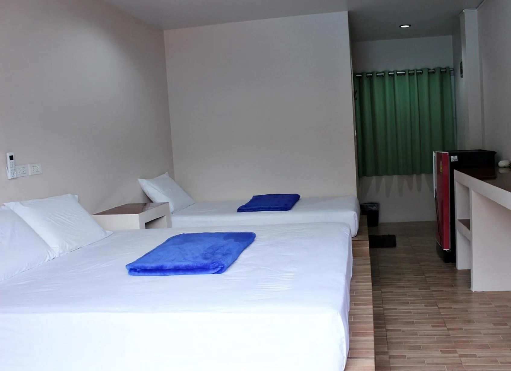 Bed in Sairee Center Guest House