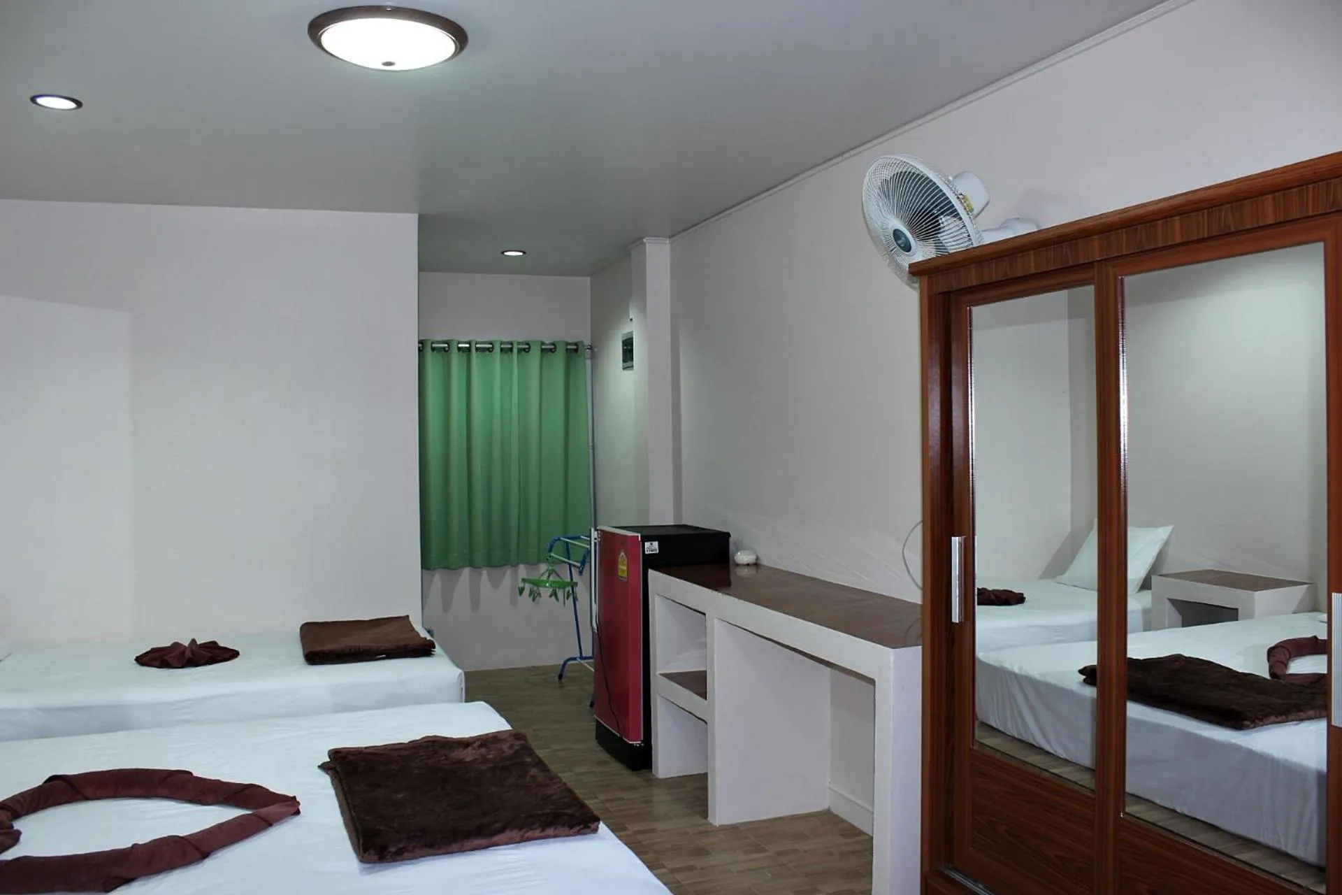 Decorative detail, Bed in Sairee Center Guest House