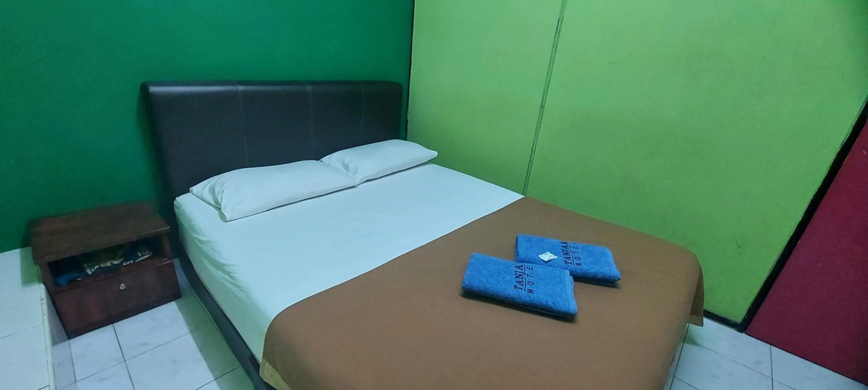 Bed in Tanjak Hotel