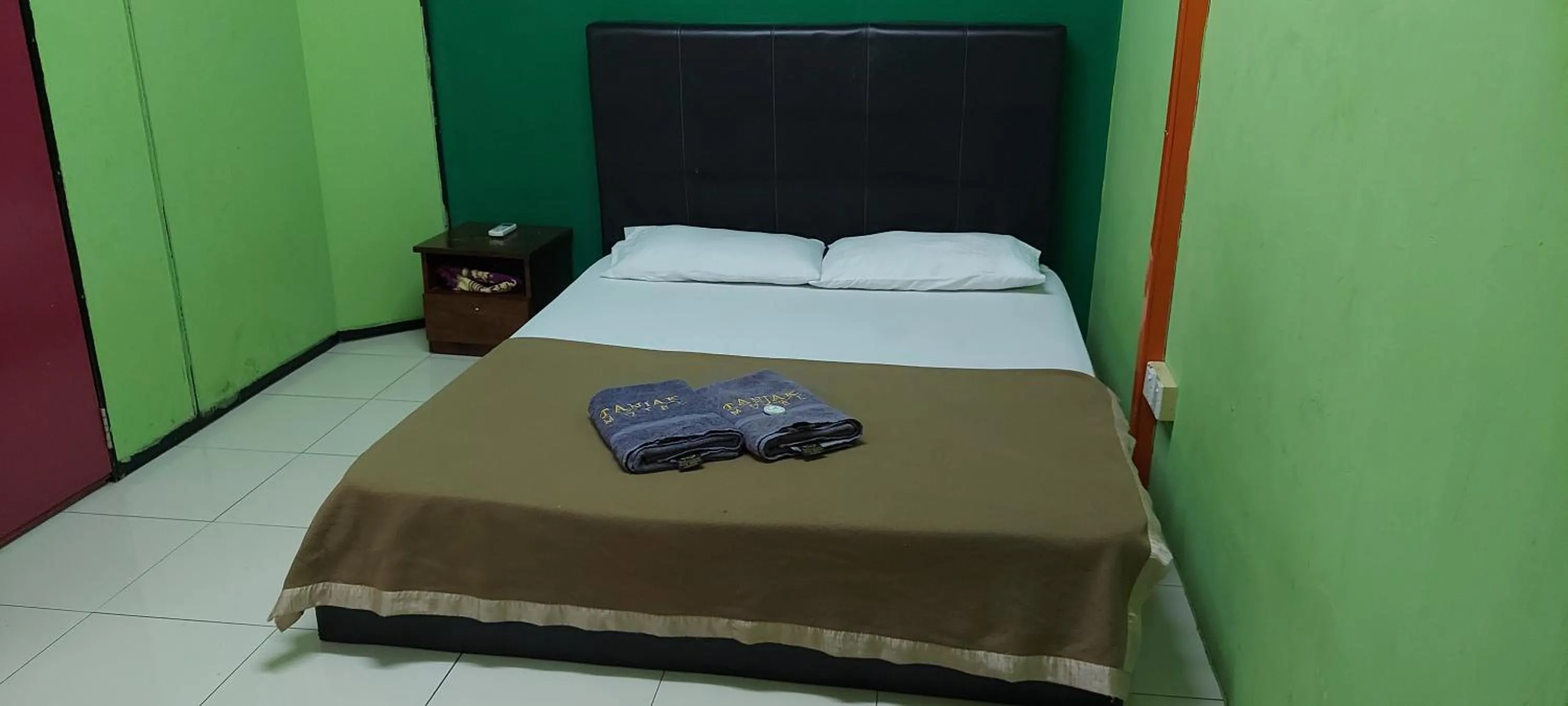 Bed in Tanjak Hotel