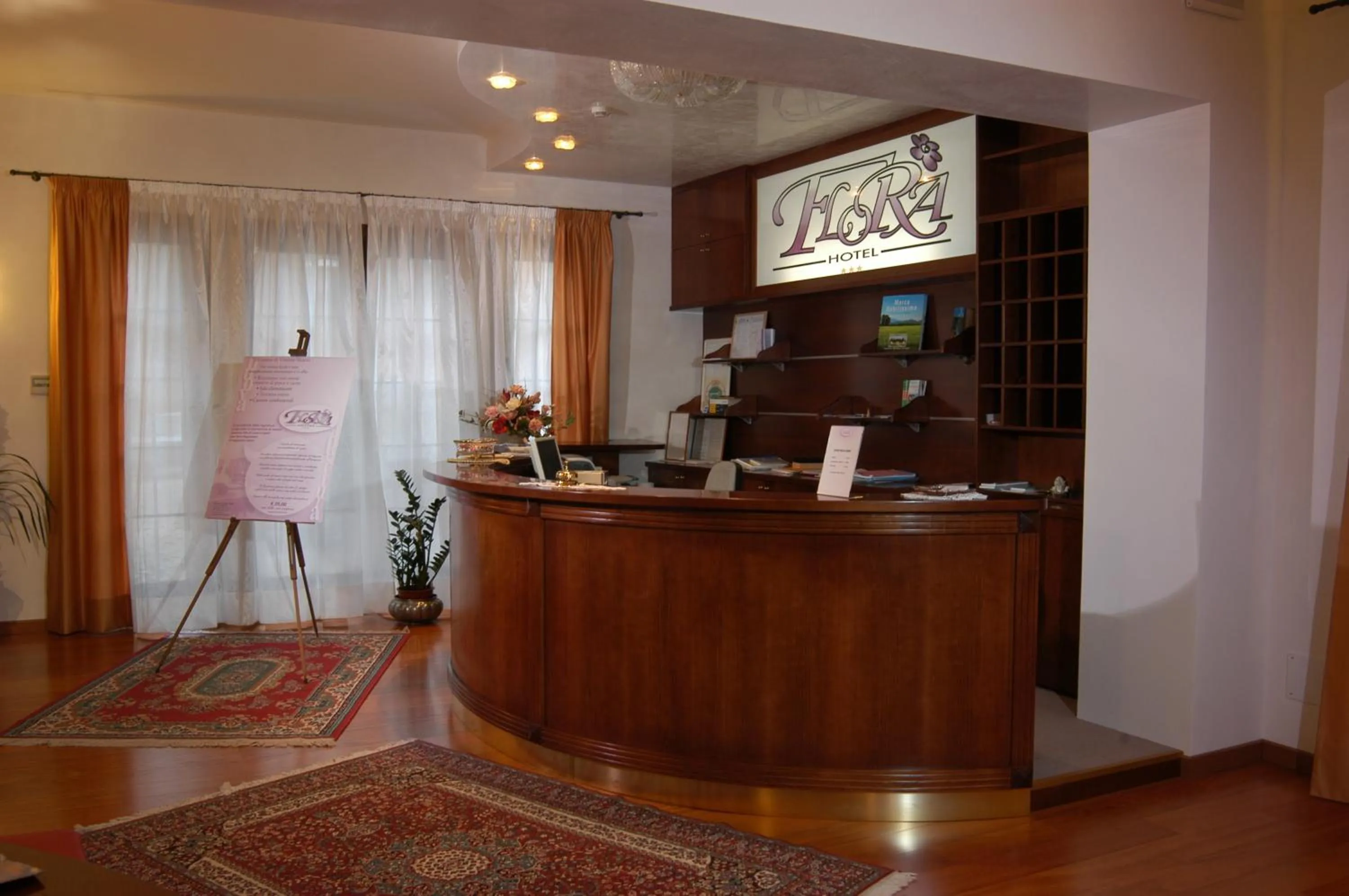 Lobby or reception in Albergo Ristorante Flora