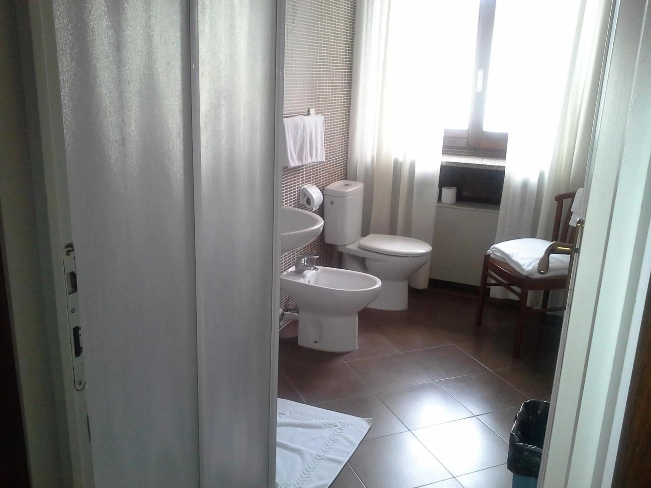 Toilet in Hotel Ticino Ristorante Chierico