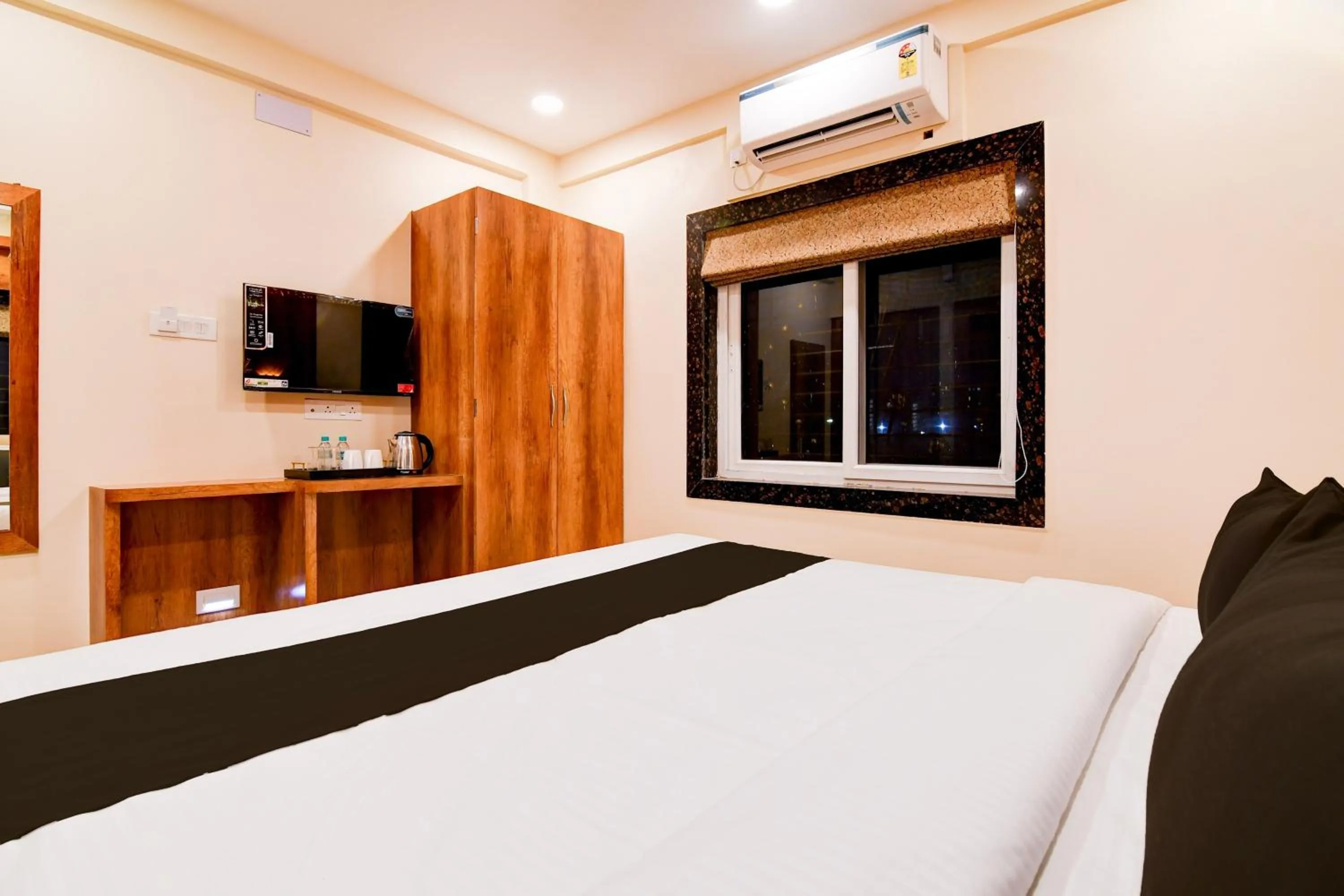 Bedroom in Hotel O Grand Inn