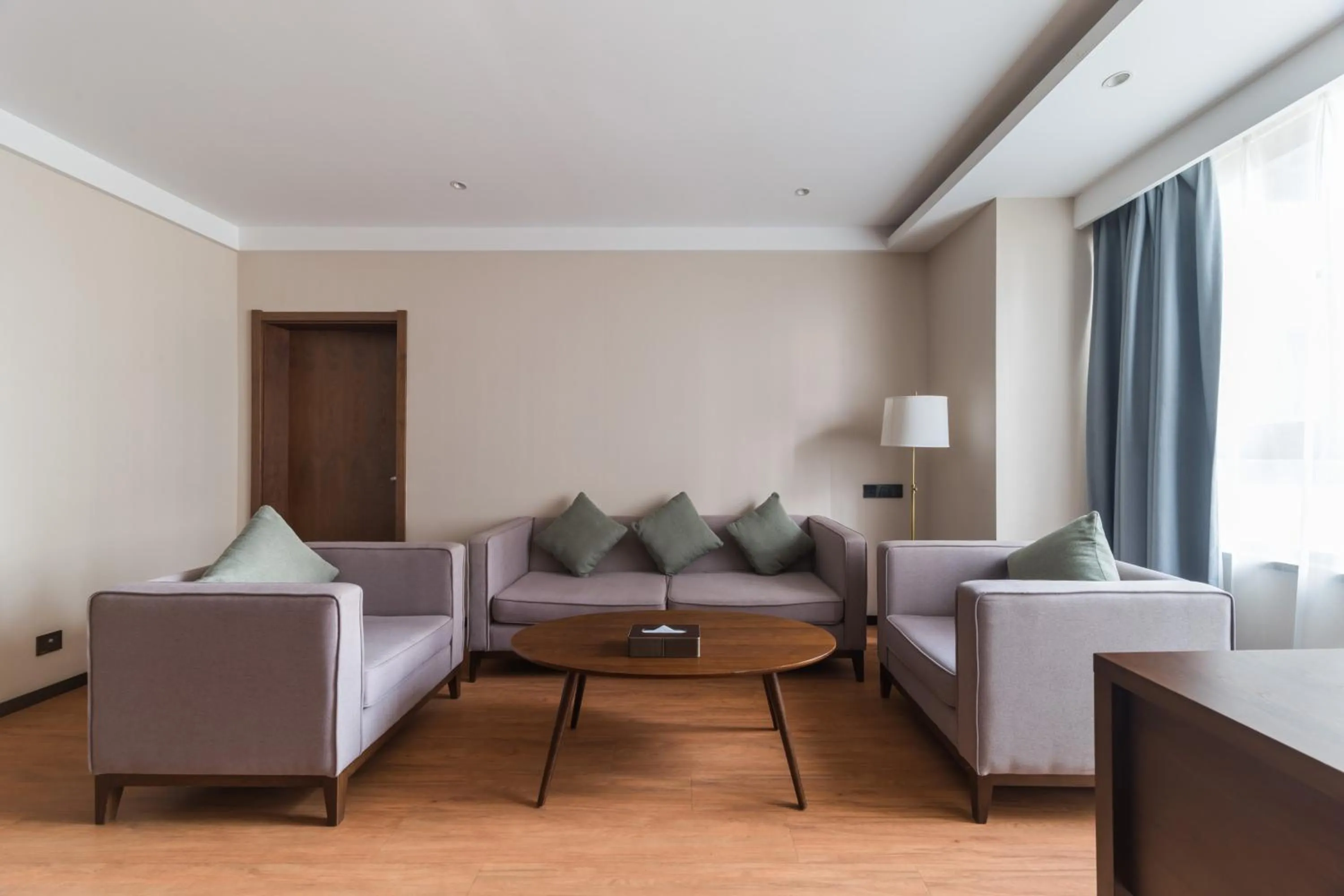 Living room in GeMei Hotel Luoyang Longmen High-speed Railway Station