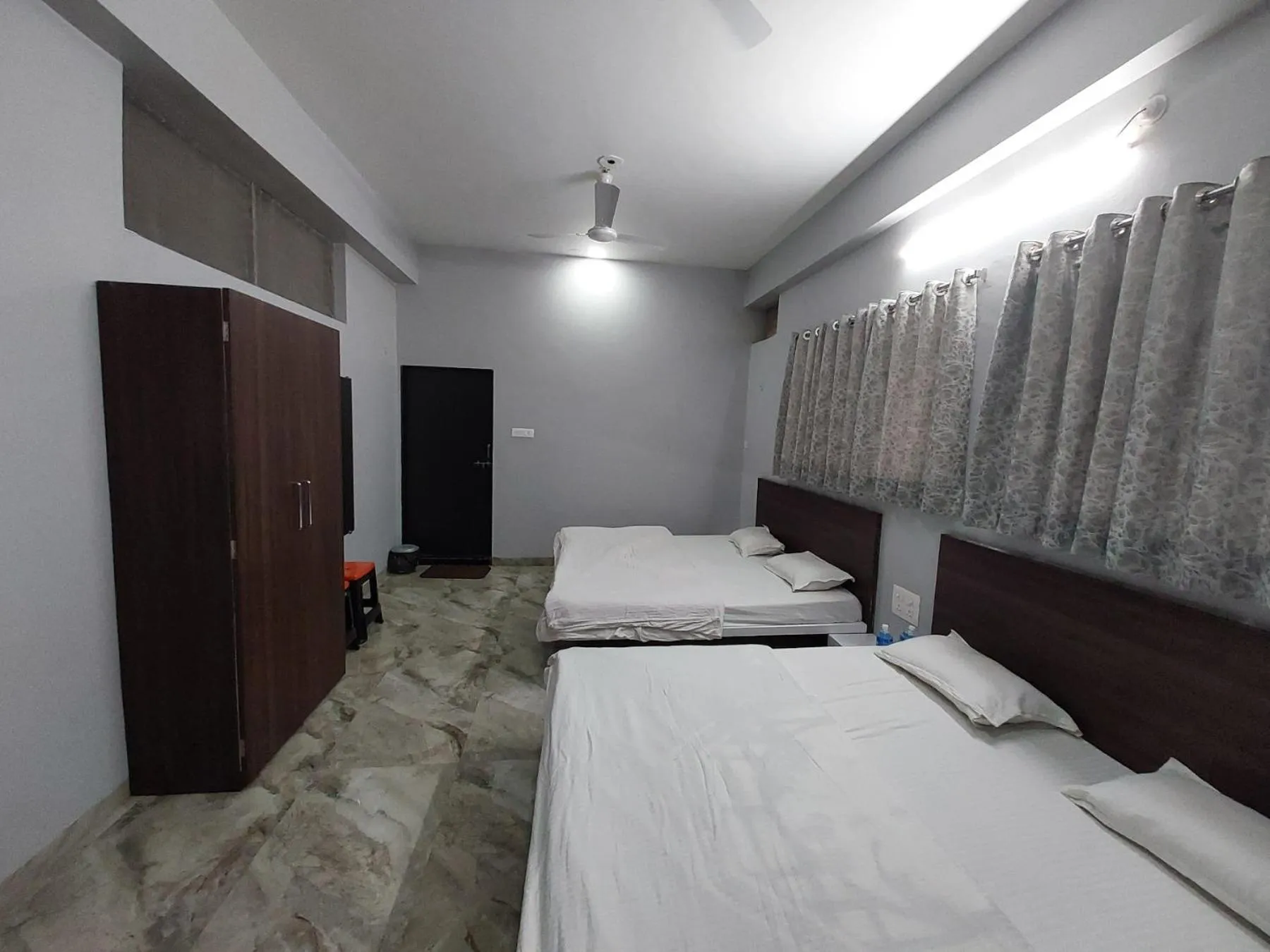 Bed in HOTEL MUSHAK by BAPPA PALACE