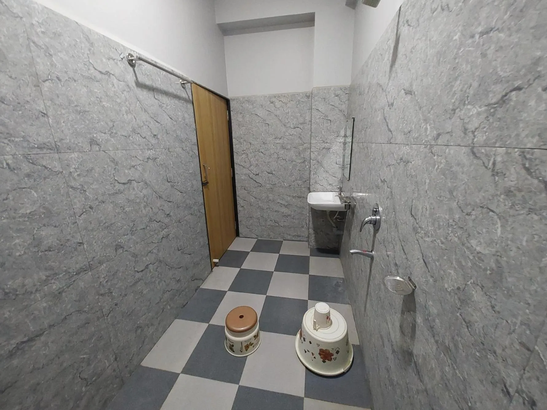 Toilet in HOTEL MUSHAK by BAPPA PALACE