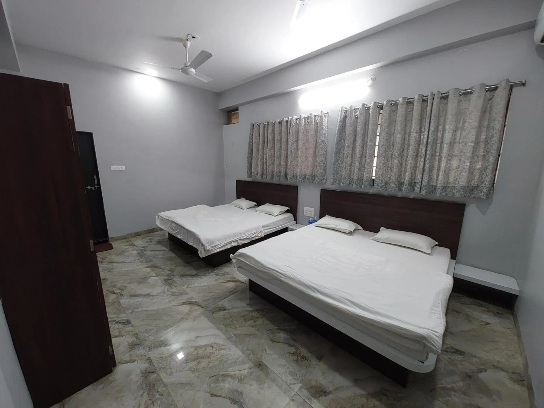 Bed in HOTEL MUSHAK by BAPPA PALACE
