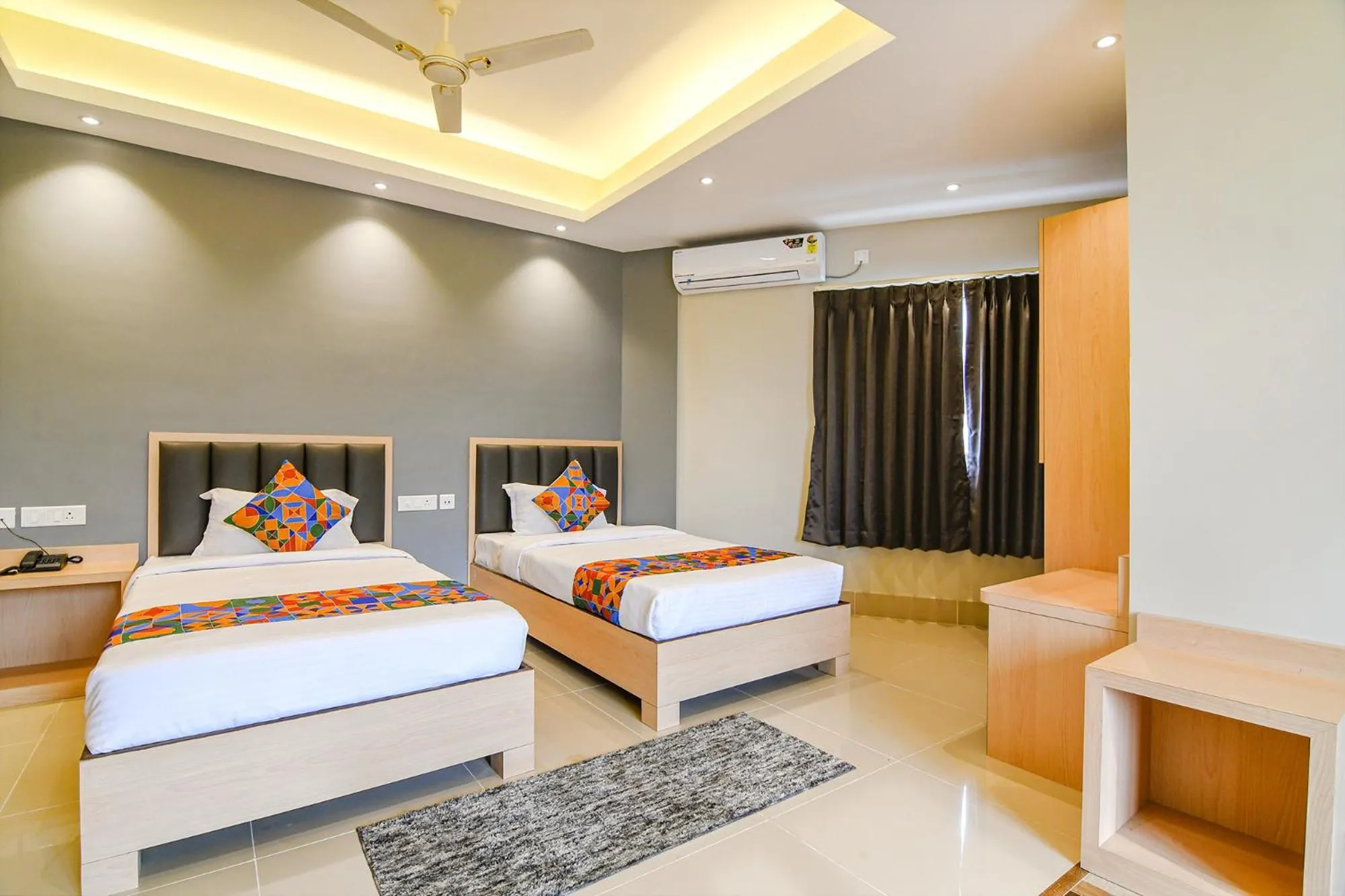 Bed in FabHotel JP - Nr Sataragachhi Railway Station