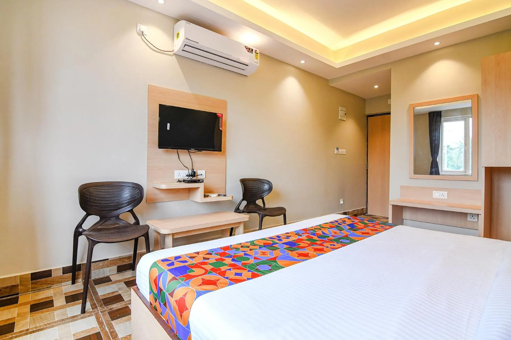 Bed in FabHotel JP - Nr Sataragachhi Railway Station