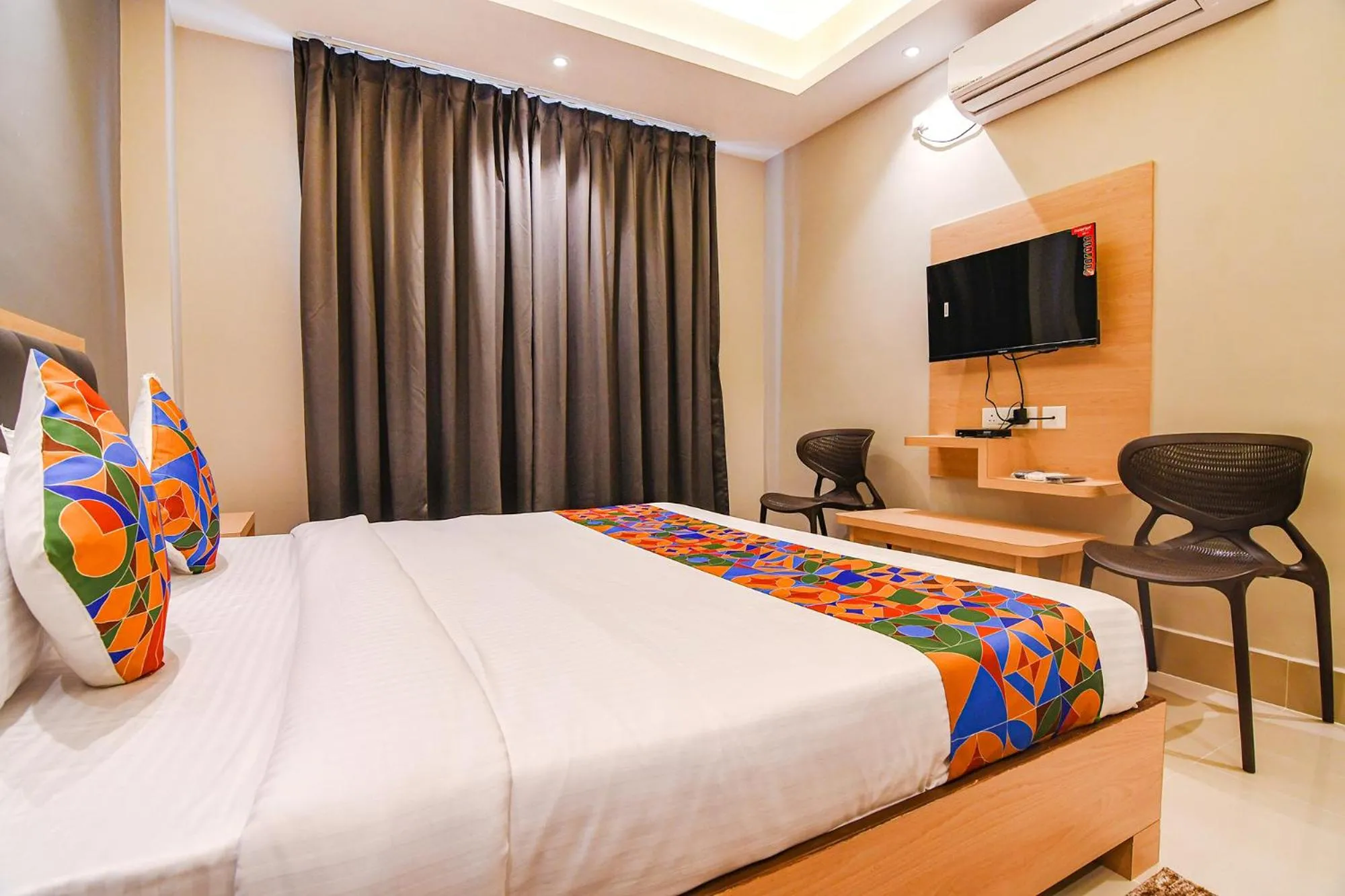 Bed in FabHotel JP - Nr Sataragachhi Railway Station
