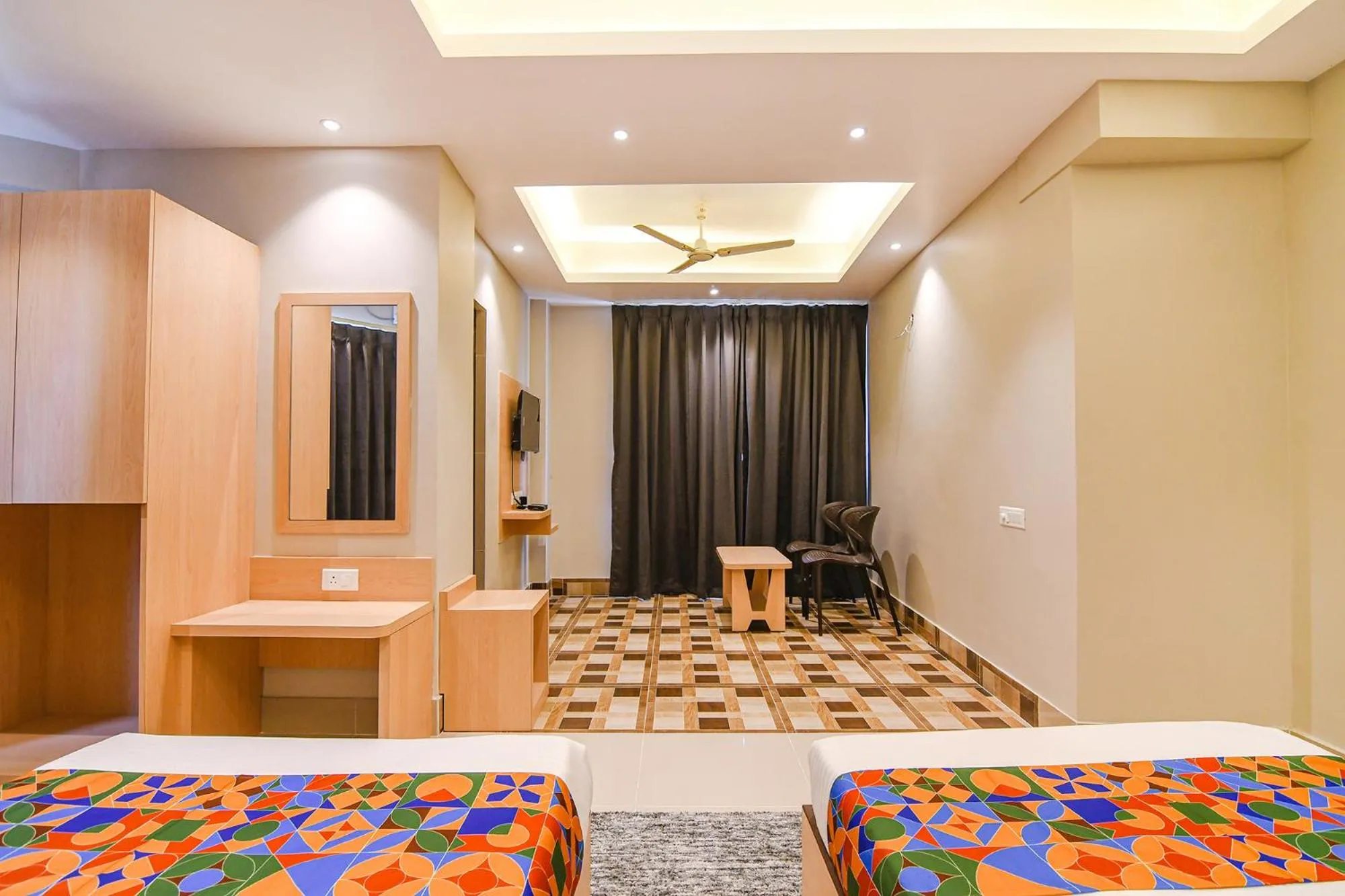 Bed in FabHotel JP - Nr Sataragachhi Railway Station